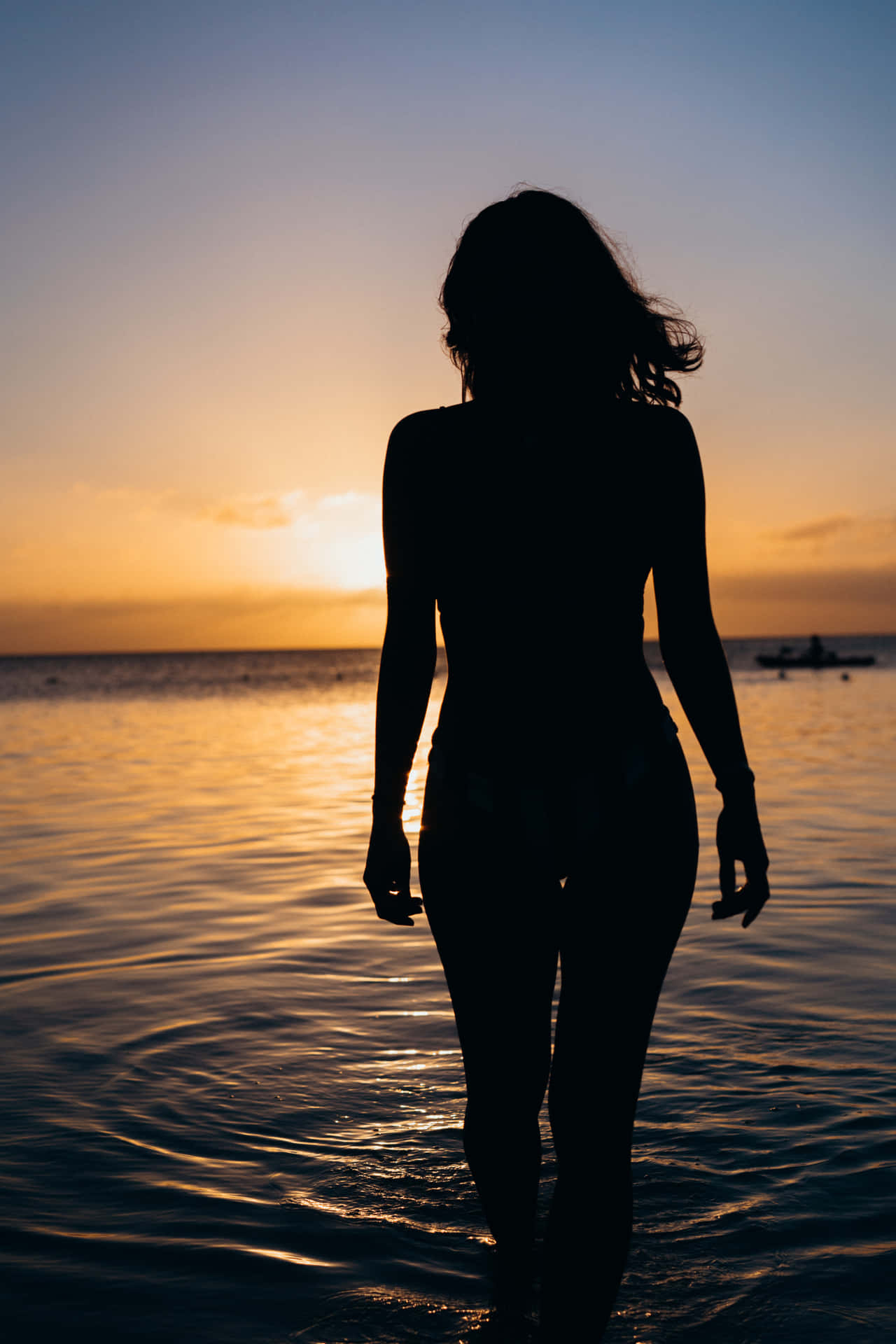 Woman Silhouette On Water Background