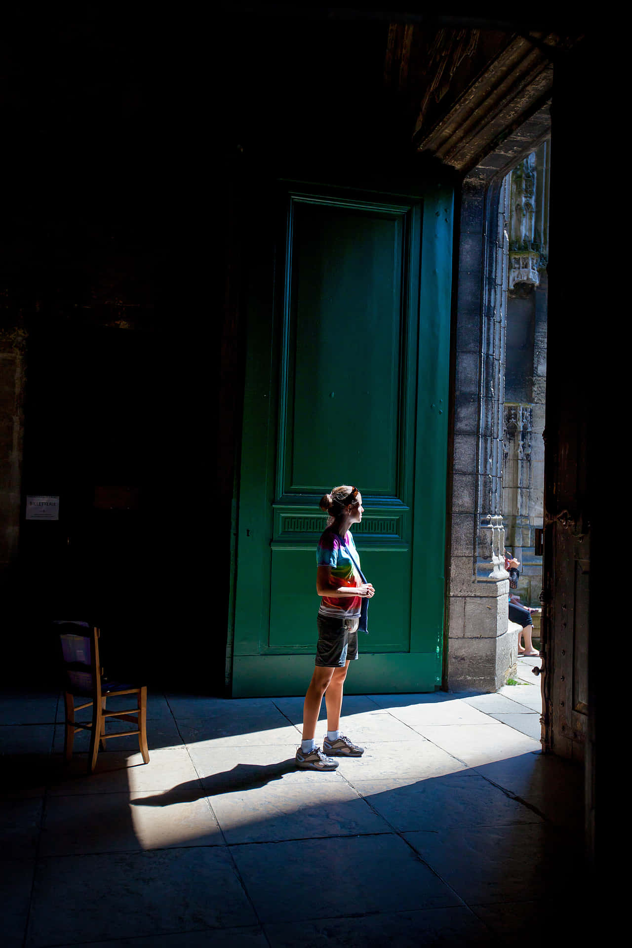 Woman Standing By Open Door Background