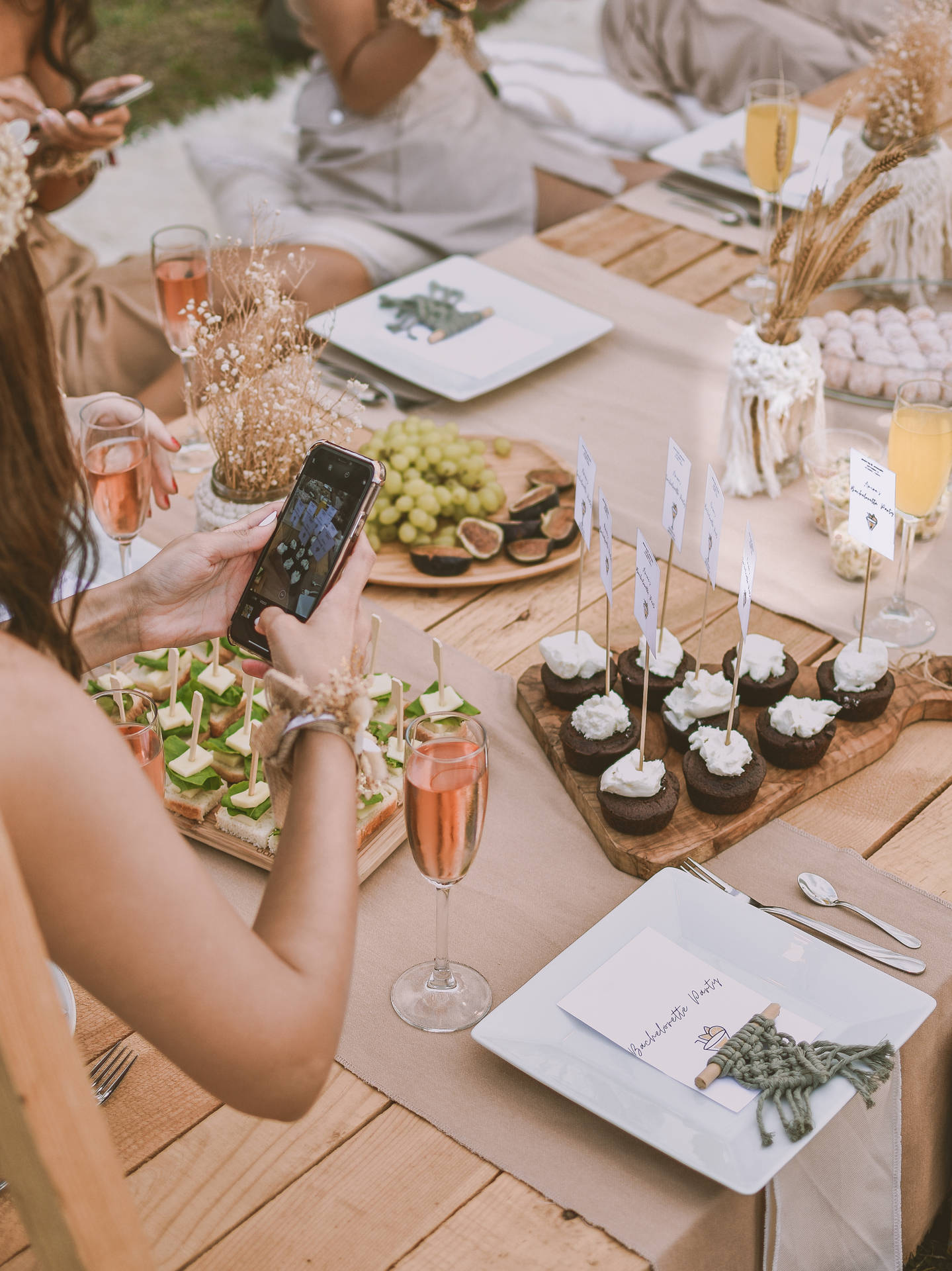 Woman Taking Photo Of Bachelorette Party Food Background