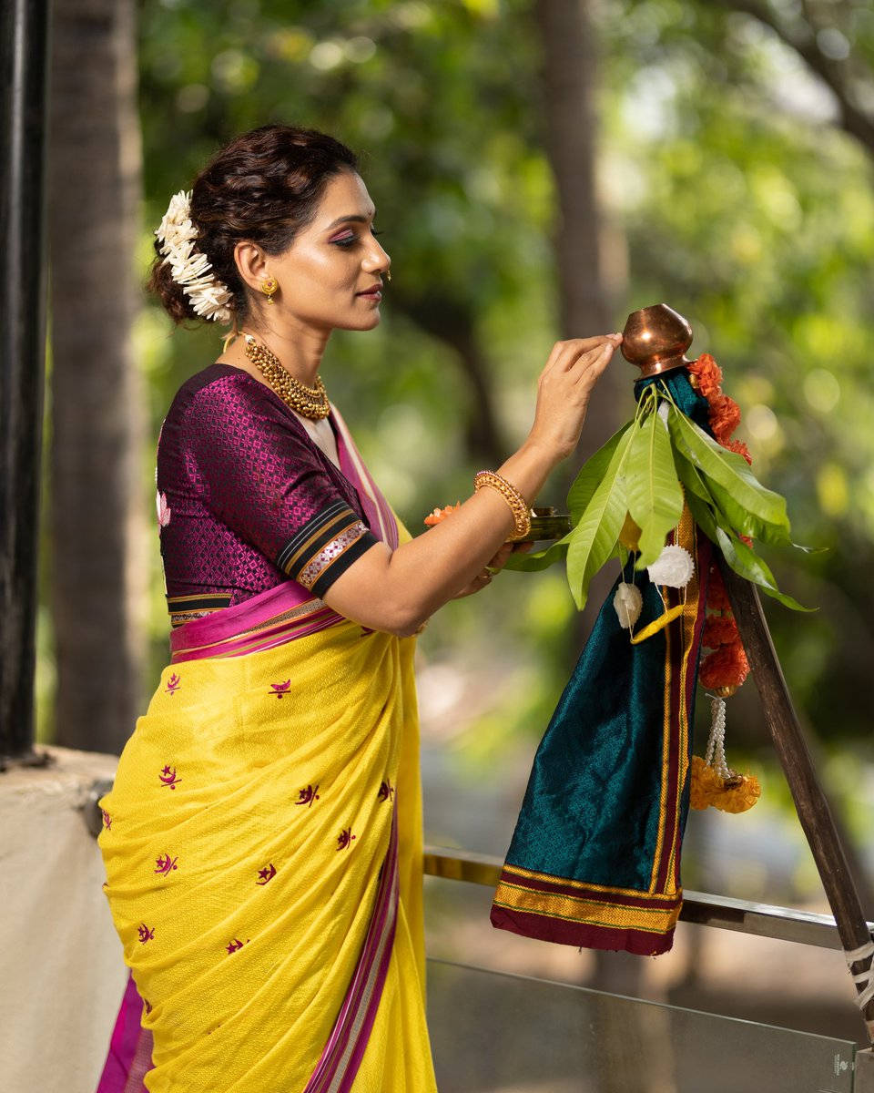 Woman Touching A Gudi Padwa Showpiece Background