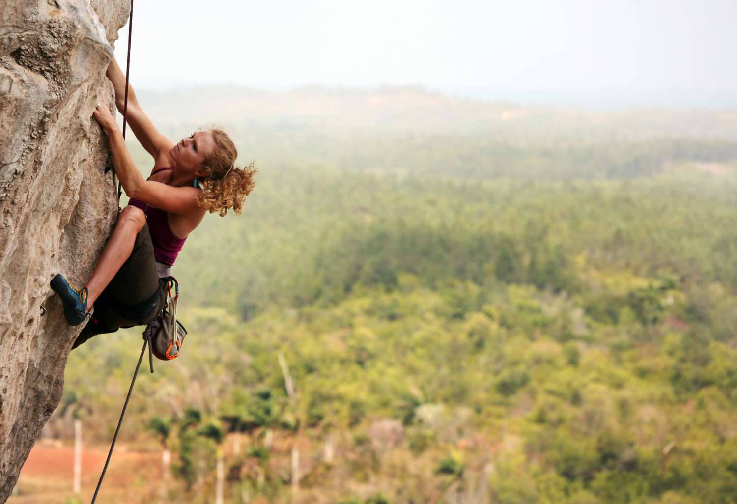 Woman Tries Rock Climbing Background