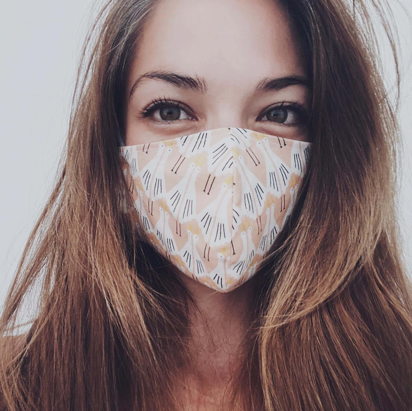 Woman Wearing Patterned Face Mask Background