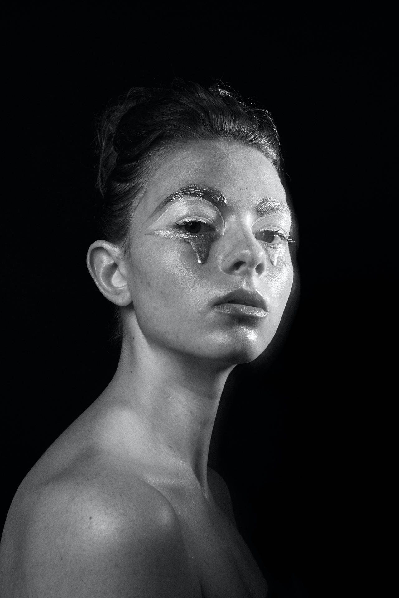 Woman With A Theater Makeup Black And White Portrait