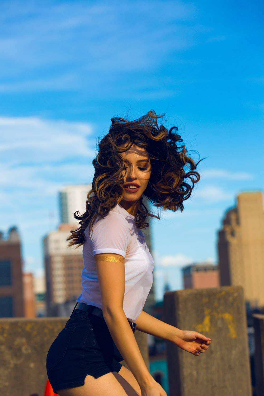 Woman With Bouncy Curly Hair Background