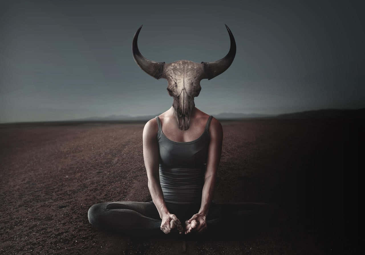 Woman With Bull Skull As Head Background