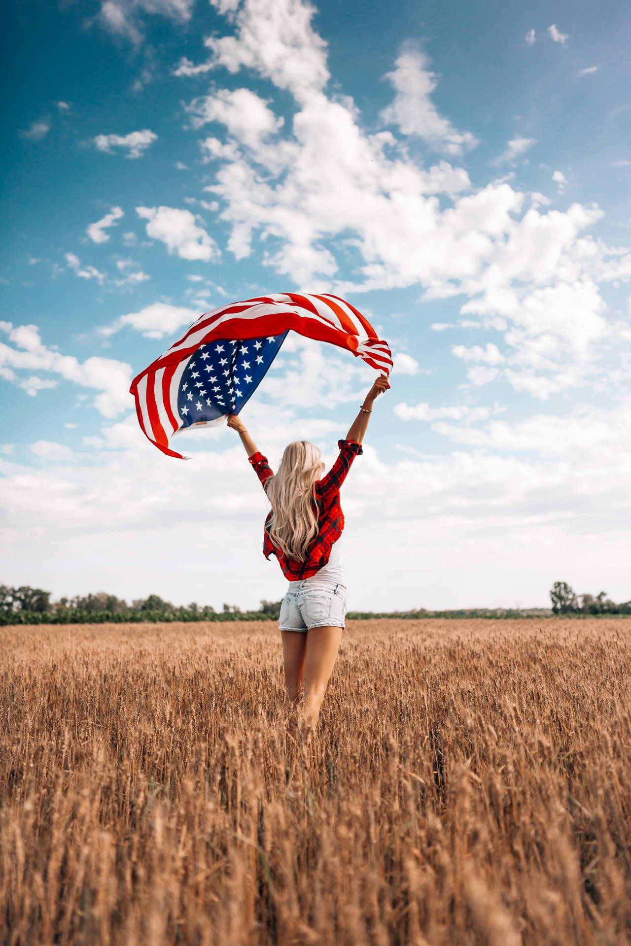 Woman With Flag Standing For Freedom Background