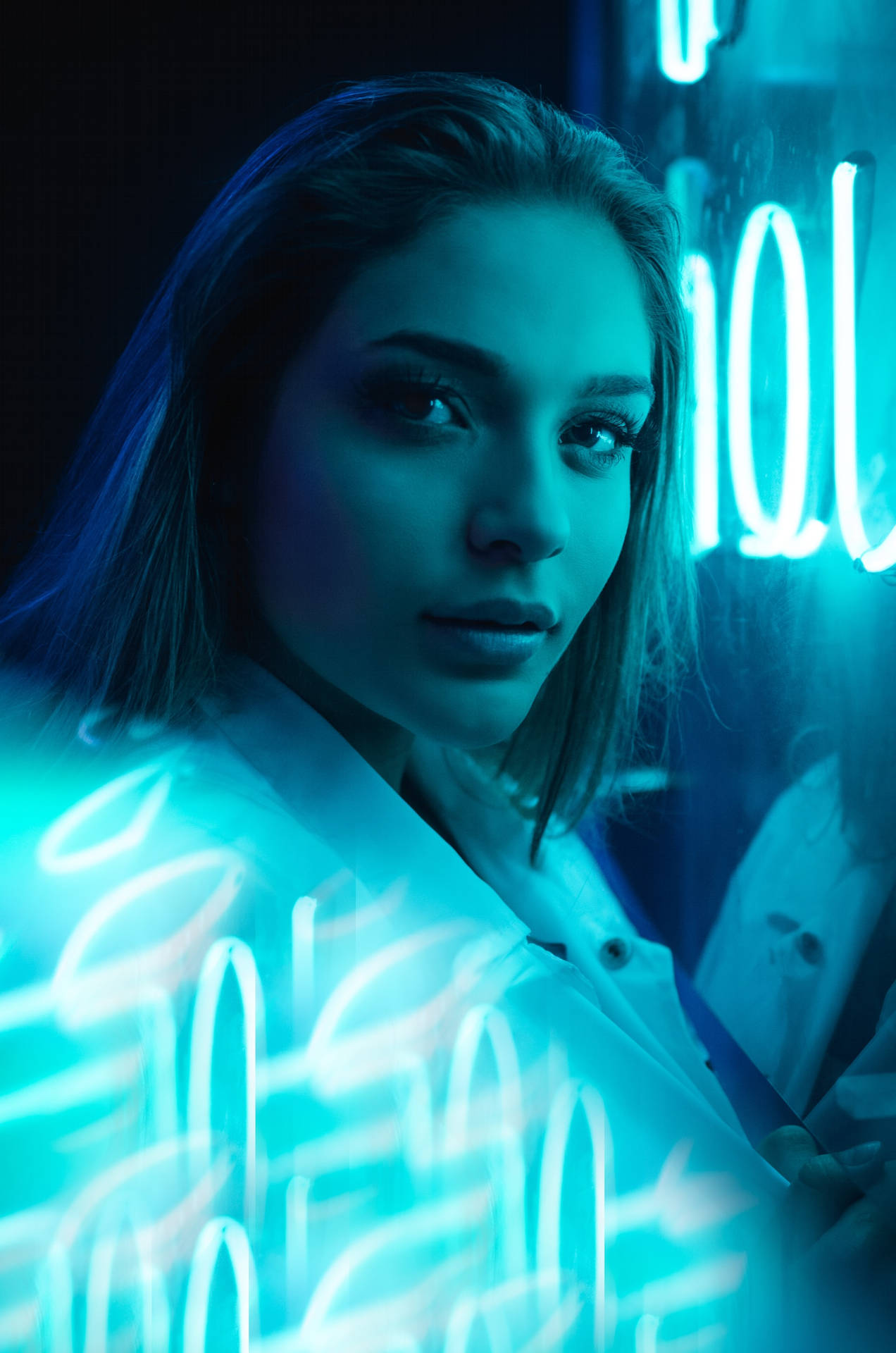 Woman With Glowing Neon Blue Iphone Background