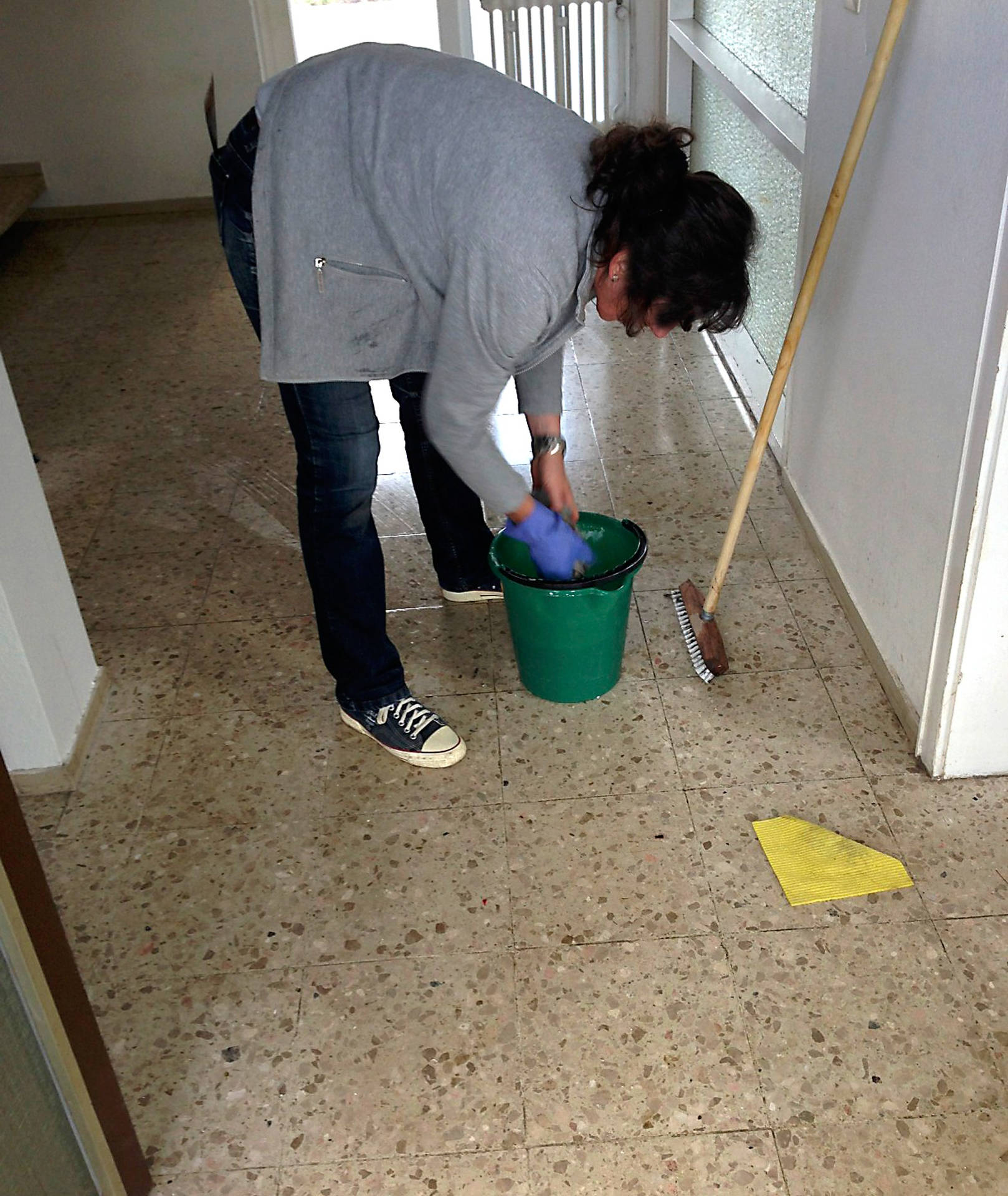 Woman With Pail And Brush House Cleaning