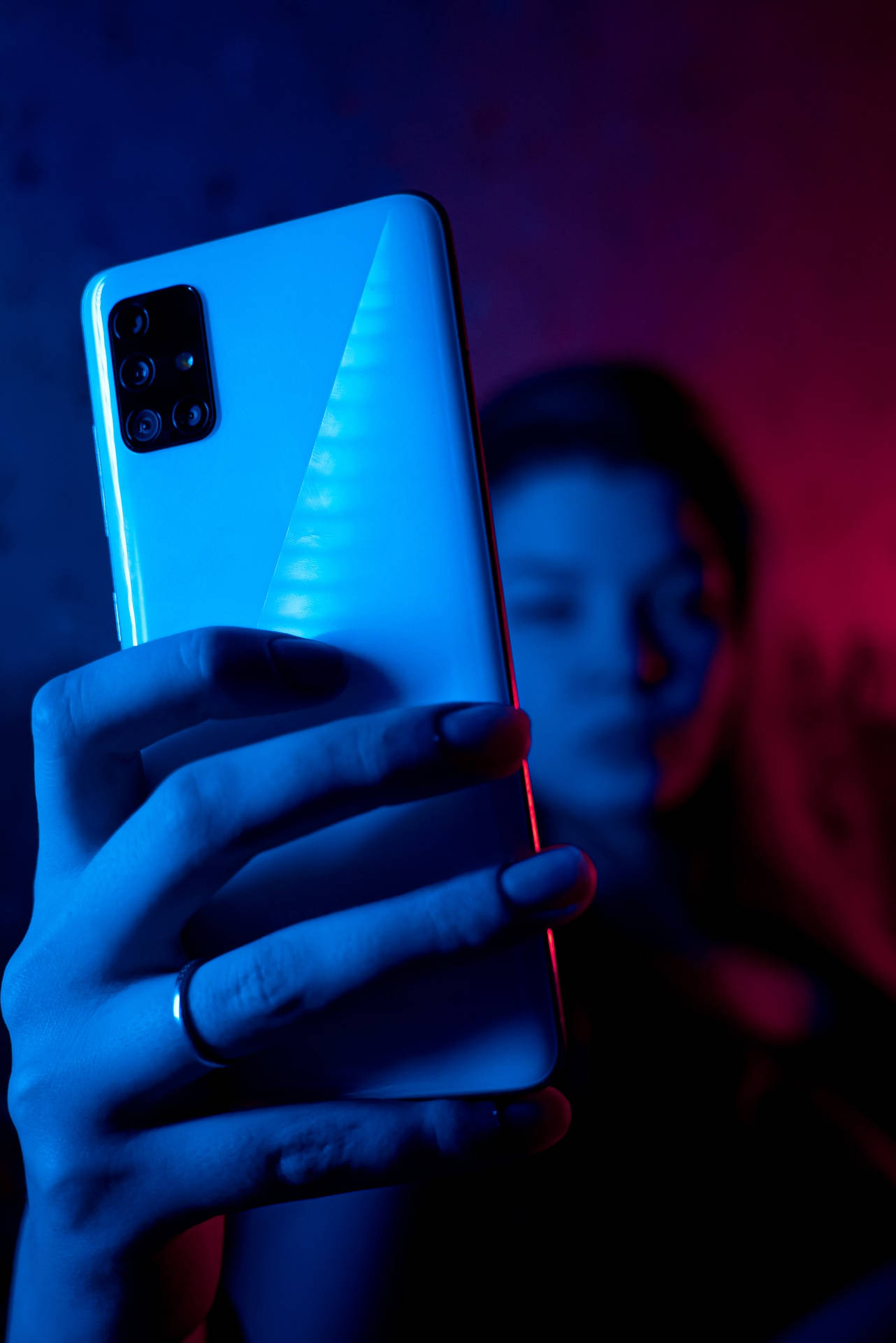 Woman With Phone In Neon Blue Iphone Background