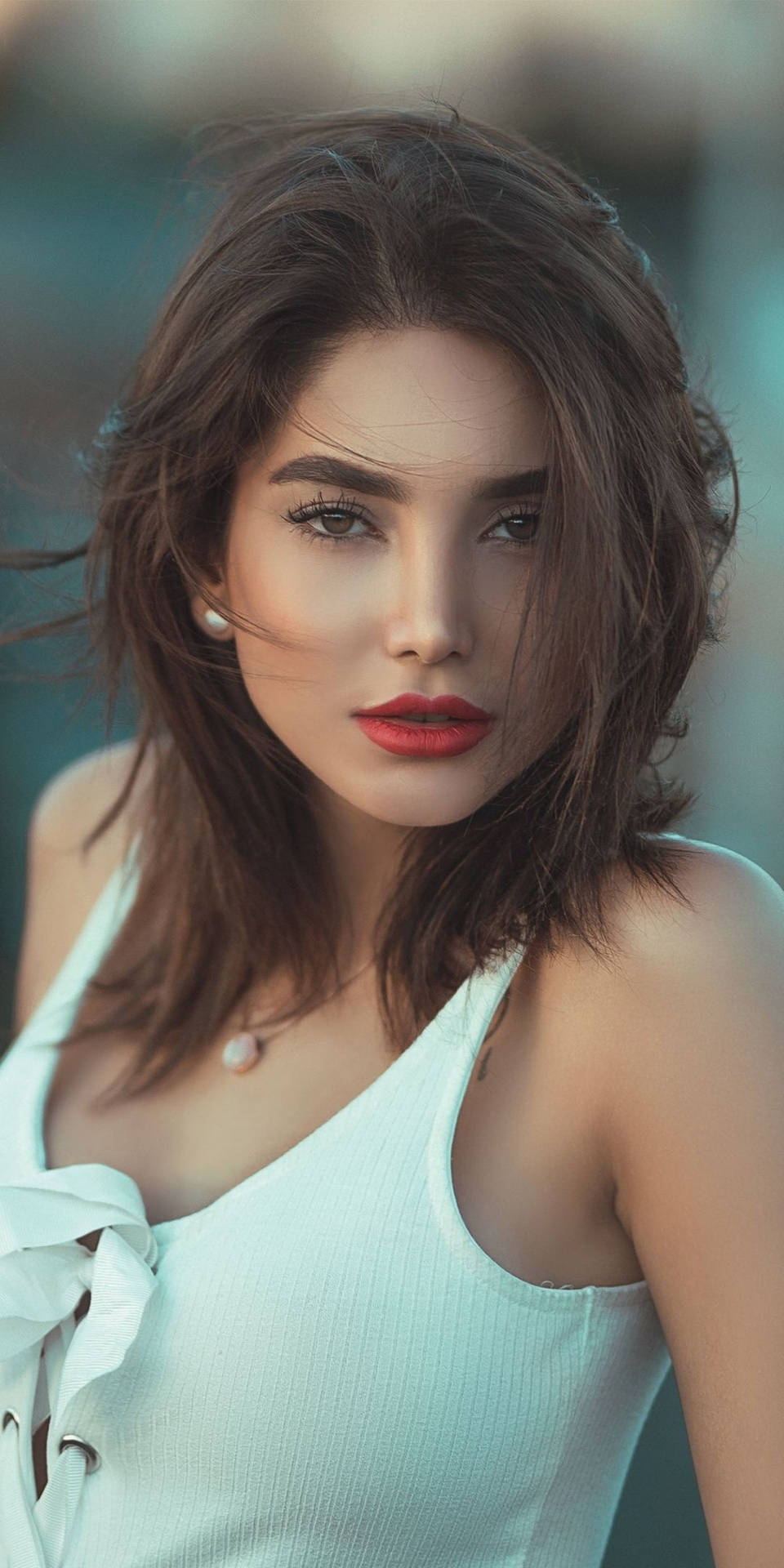 Woman With Red Lips Donning Sleeveless Top Background