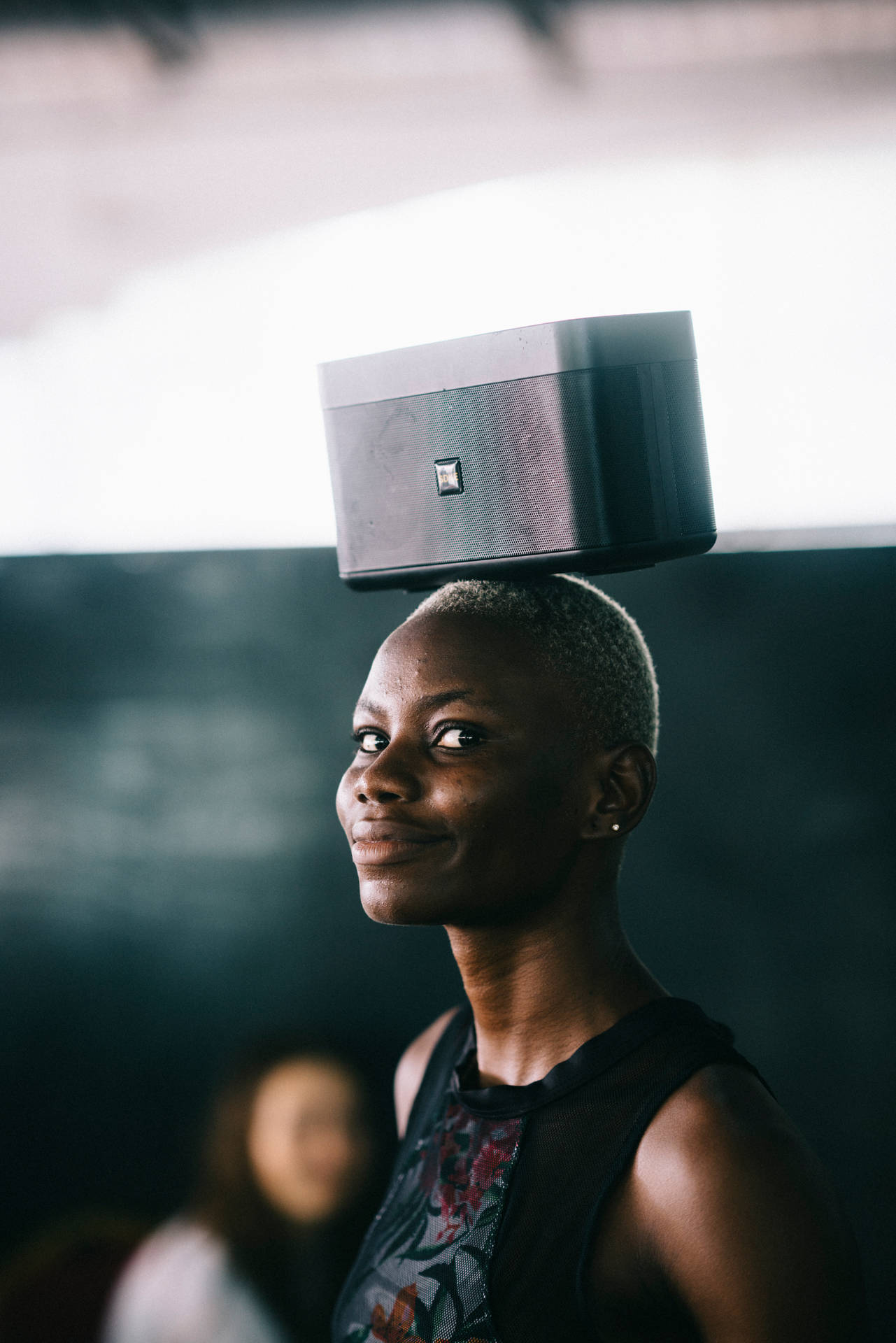 Woman With Stereo On Head In Sierra Leone Background