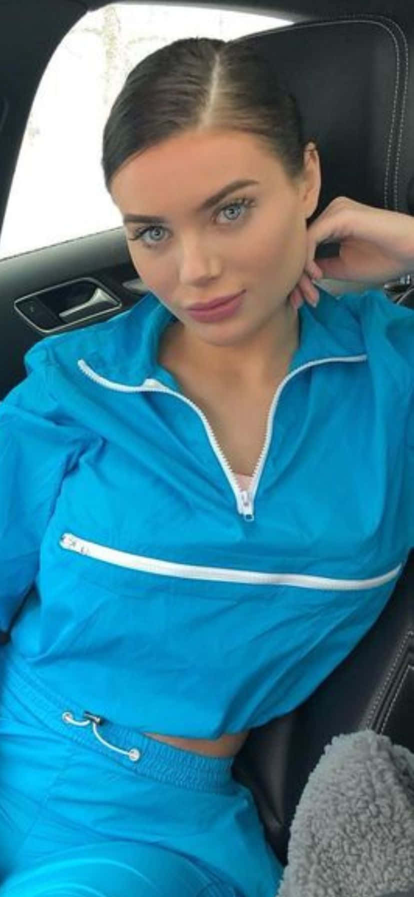 Womanin Blue Tracksuit Car Selfie Background