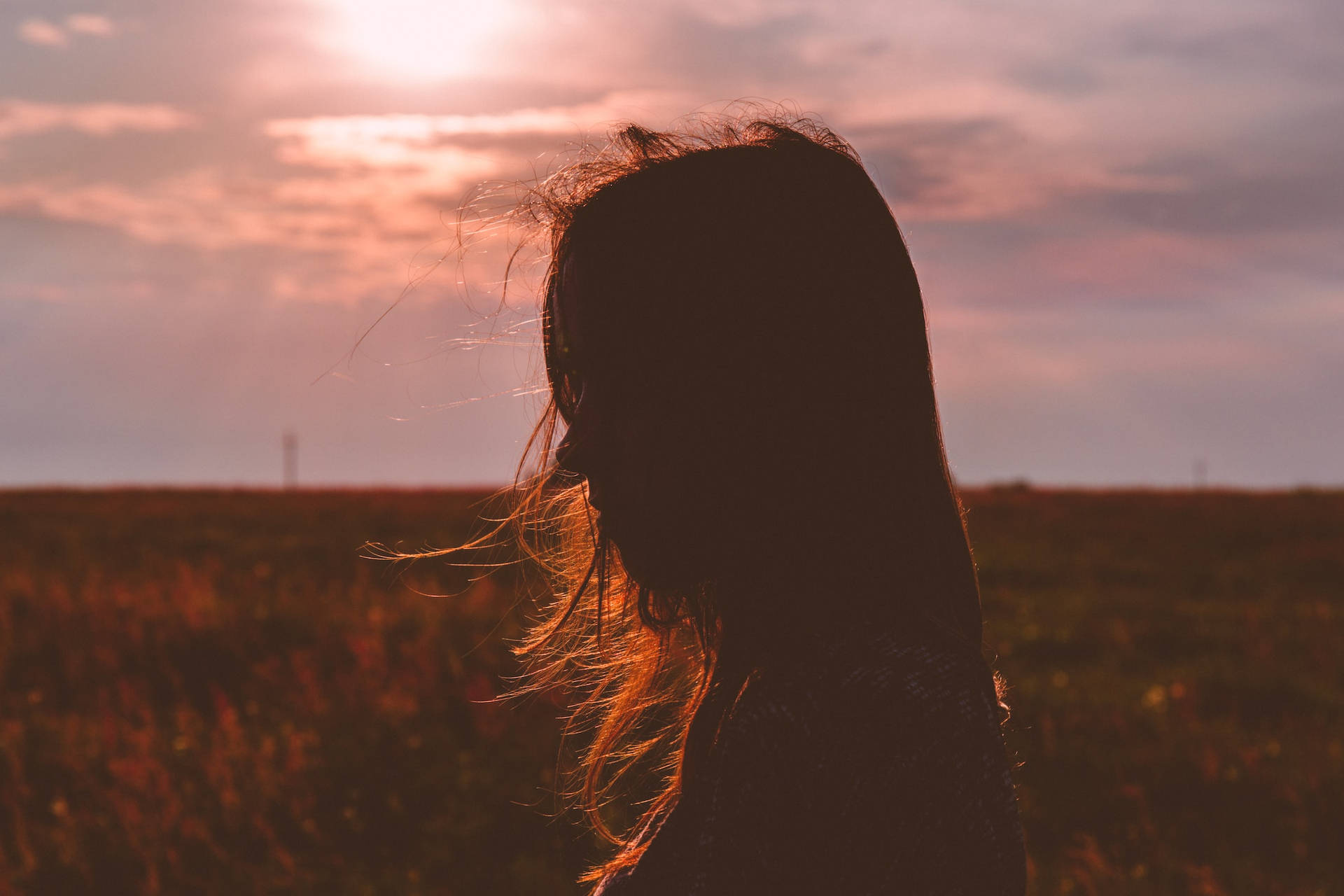 Woman’s Outline Against The Sun Profile