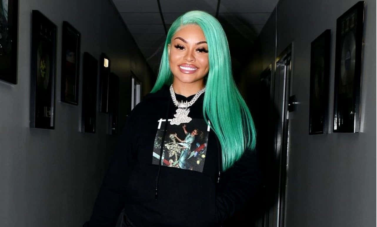 Womanwith Green Hair Smilingin Hallway Background