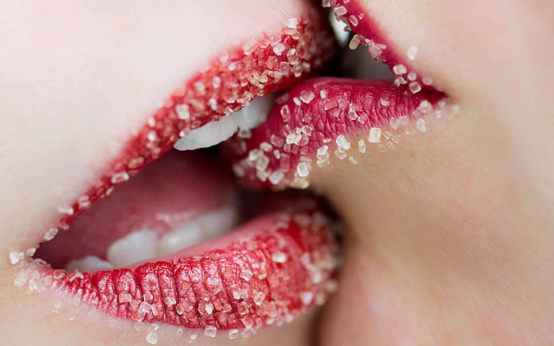 Women Kissing With Salted Lips Background