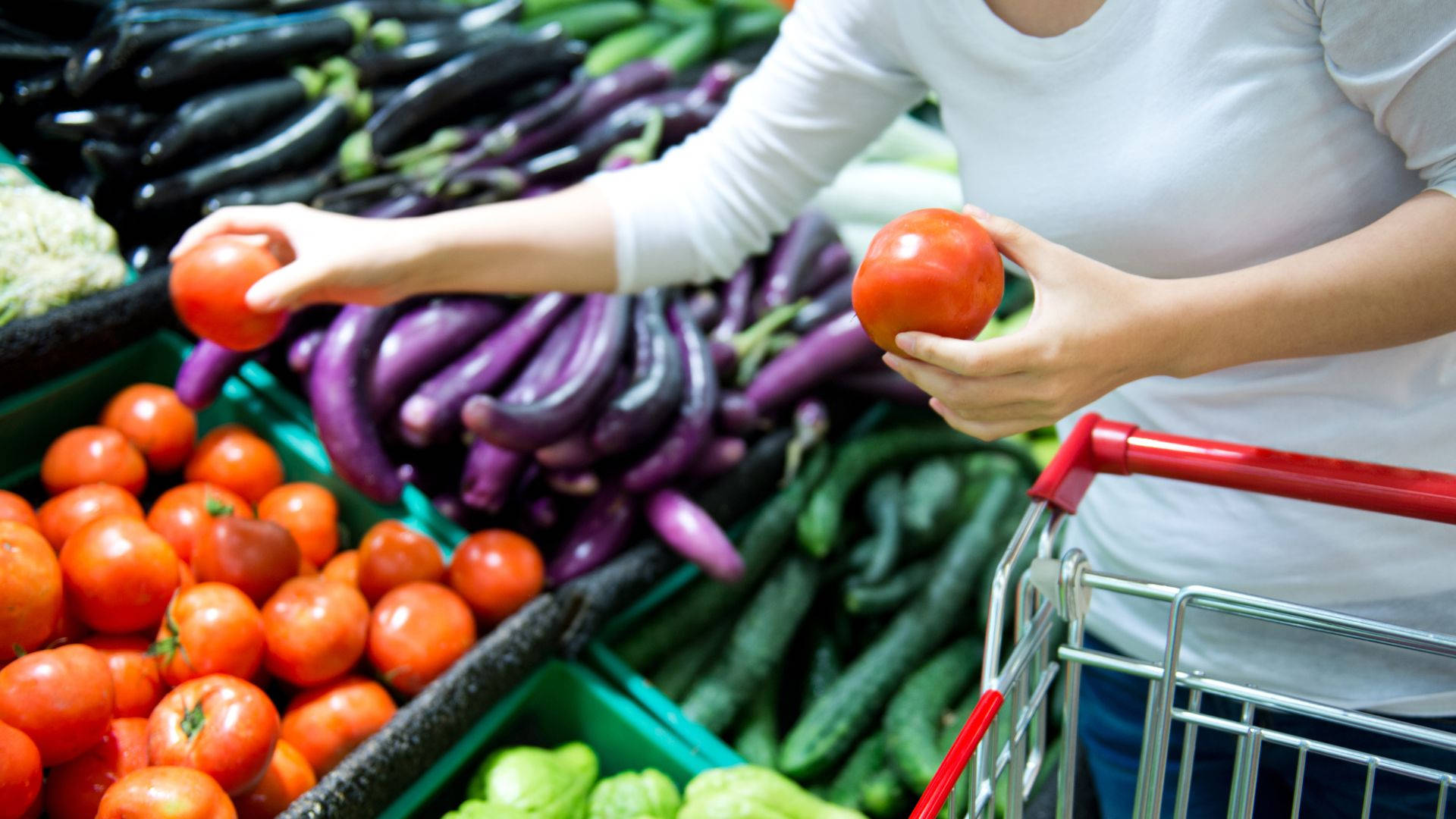 Women Shopping Fresh Vegetables At Grocery Store Background