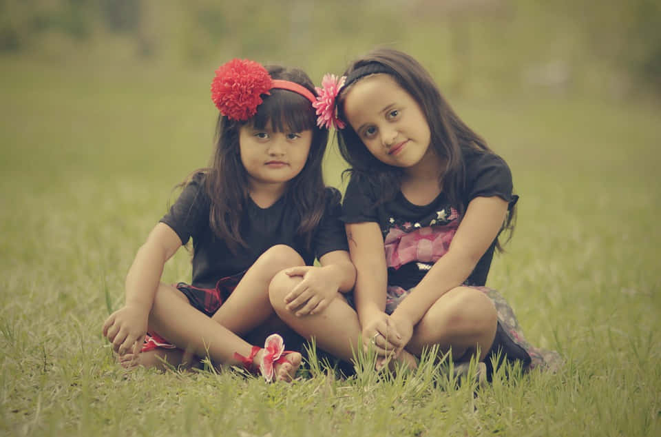 Wonderful Portrait Of Sweet Cute Sisters Background