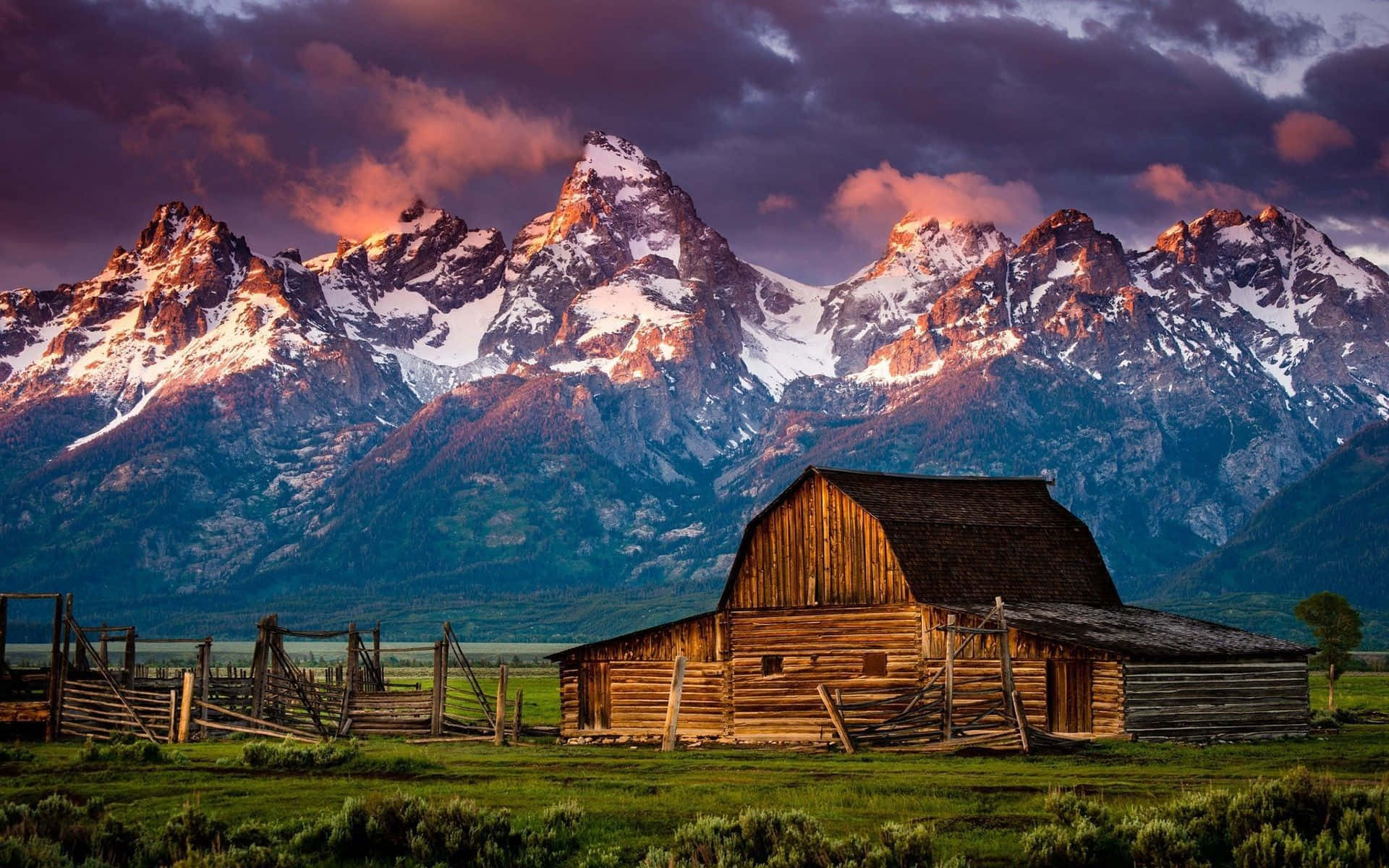 Wooden Cabin Overlooking The Mountains Background