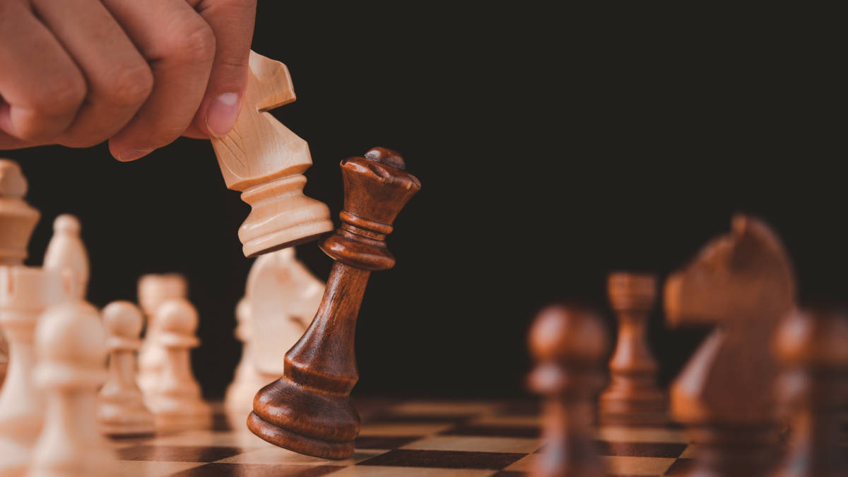 Wooden Chess Queen Versus Knight Background