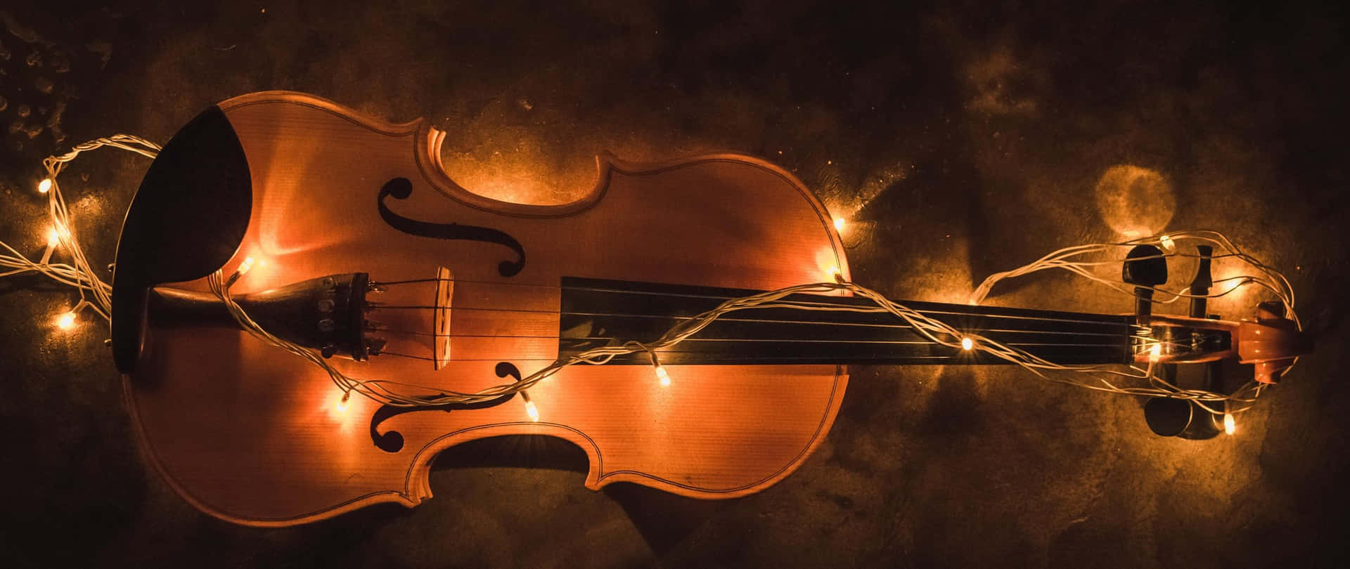 Wooden Chordophone Violin Instrument With Fairy Lights Background