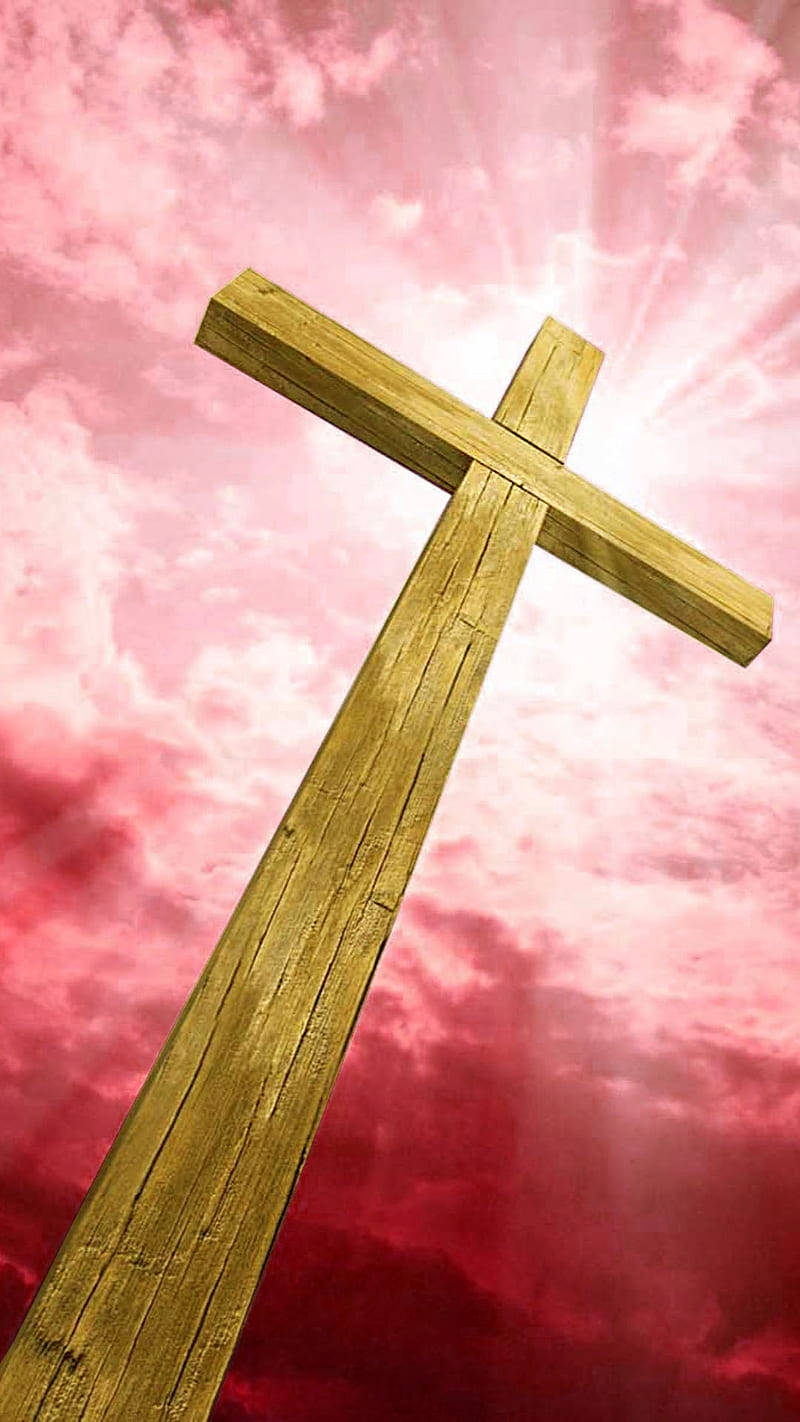 Wooden Cross Against Sky Background