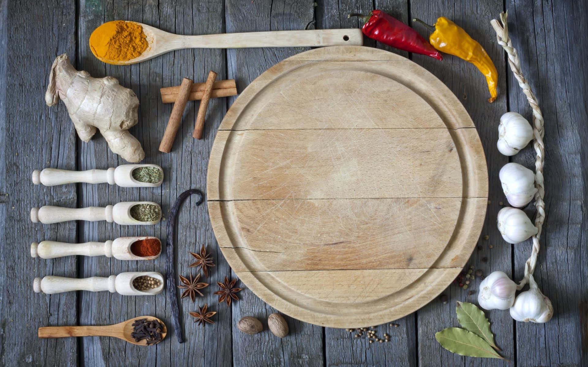 Wooden Cutting Board With Lots Of Condiments Background