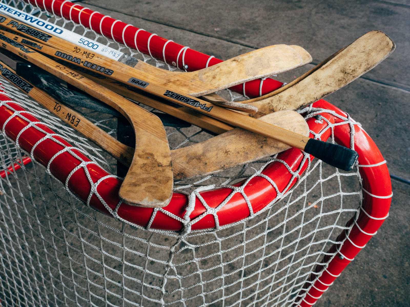 Wooden Hockey Sticks Close Up Shot Background