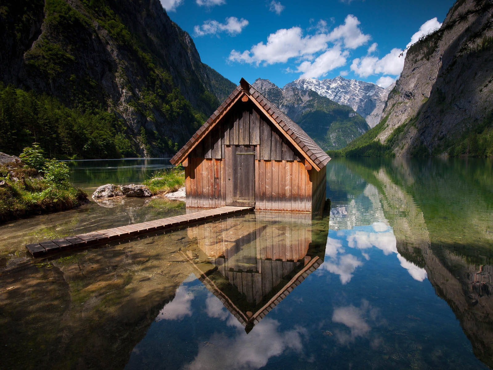 Wooden House On Astounding Scenic Mountains Background
