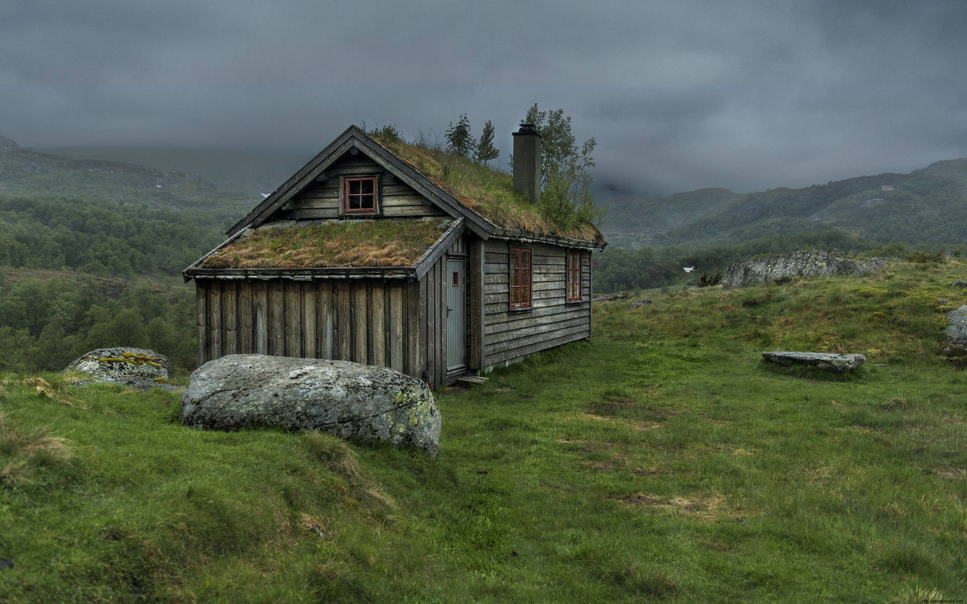 Wooden House Under A Cloudy Sky Background