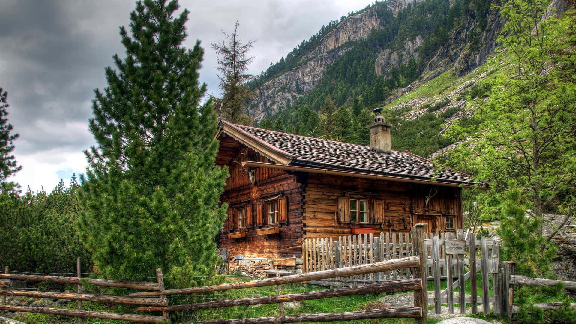 Wooden Log Cabin In Nature Background