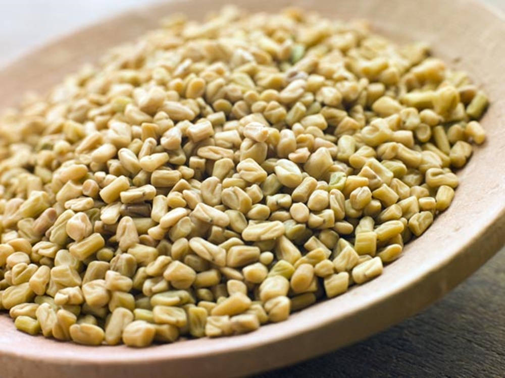 Wooden Plate Filled With Fenugreek Background