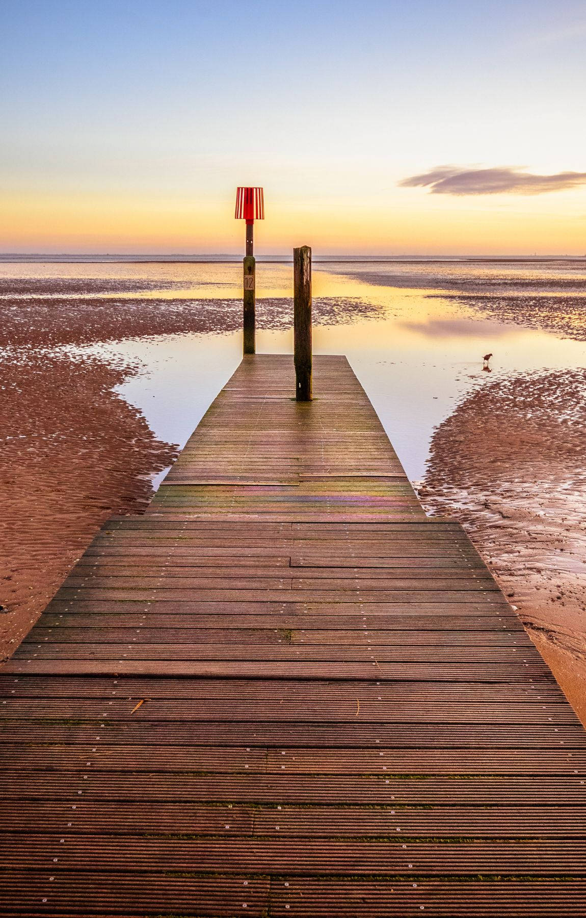 Wooden Walkway On Beach Sunrise Background