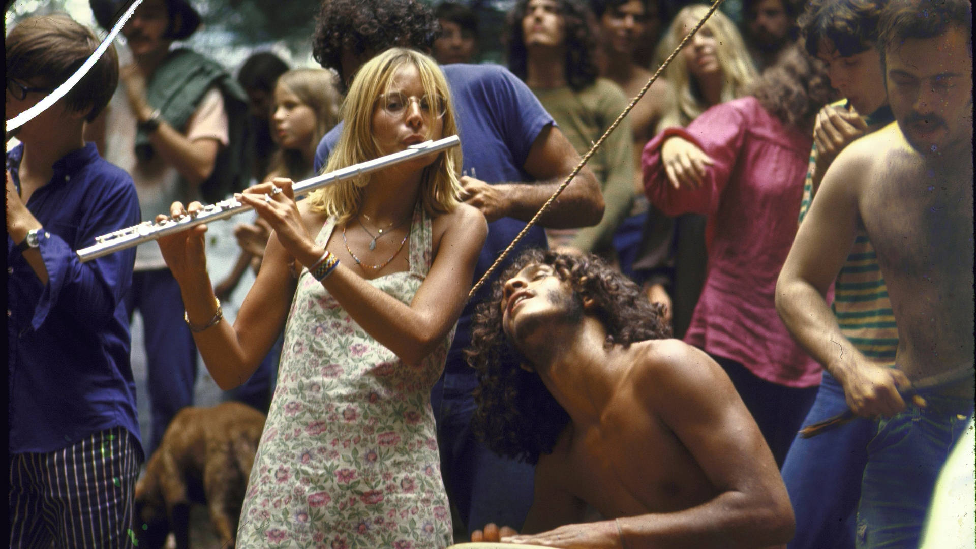 Woodstock Hippies Flutist And Drummer Background