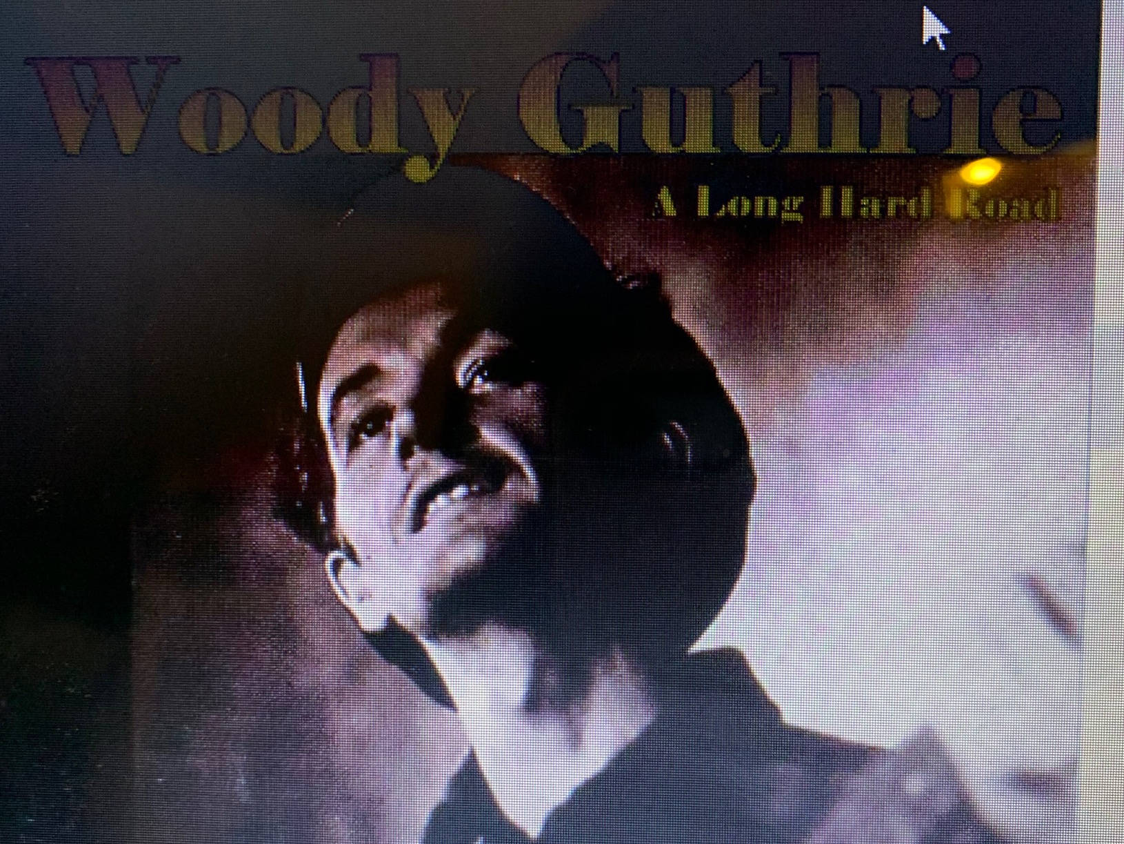 Woody Guthrie A Long Hard Road Background