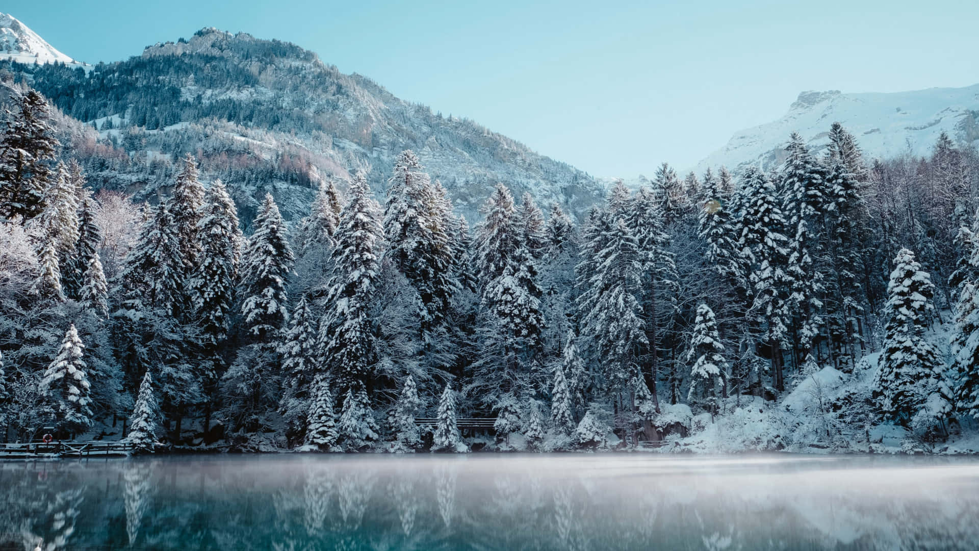 Working Away On The Laptop Through A Cold Winter Background