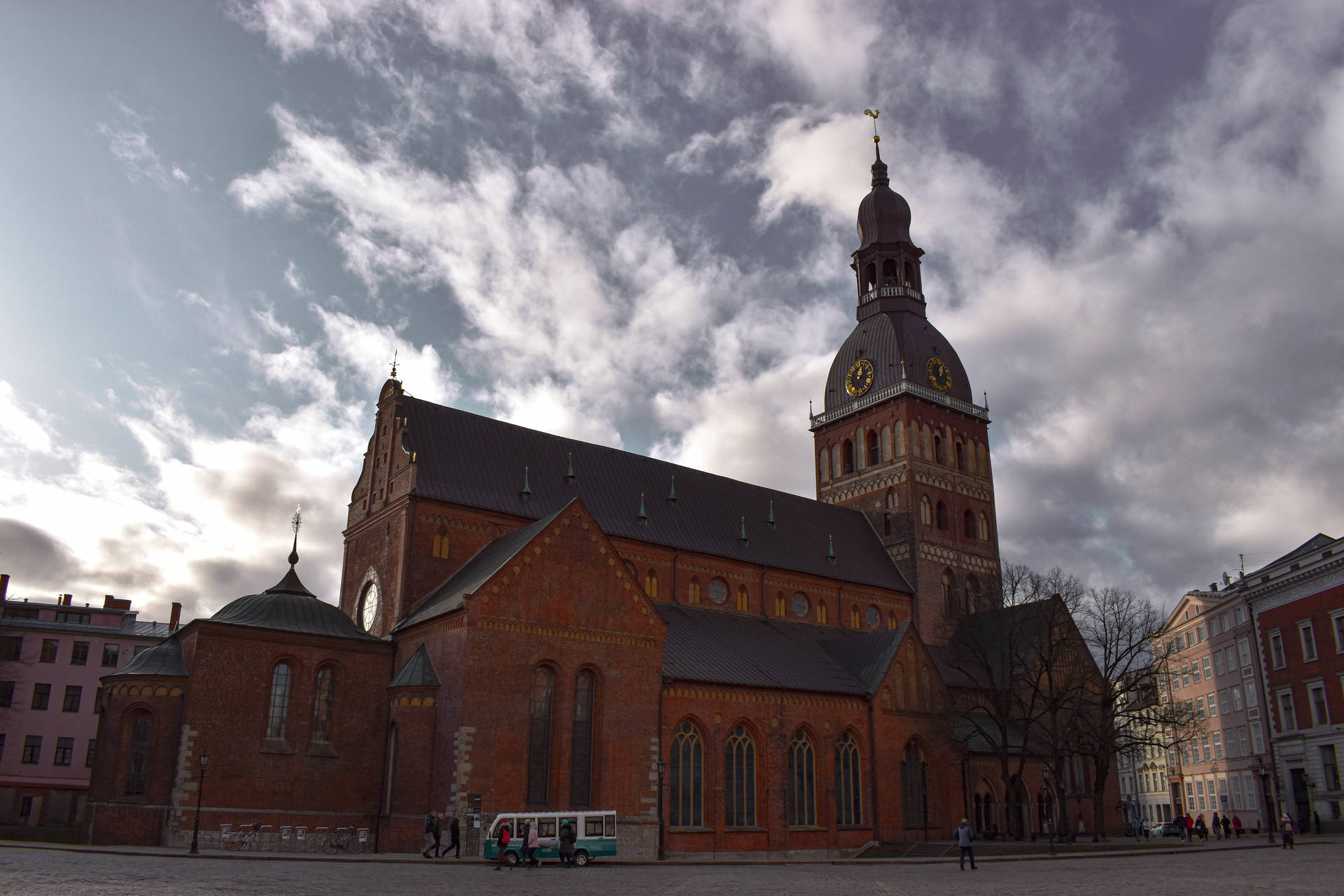 Worm's-eye View Of St. Peter's Church In Riga Background