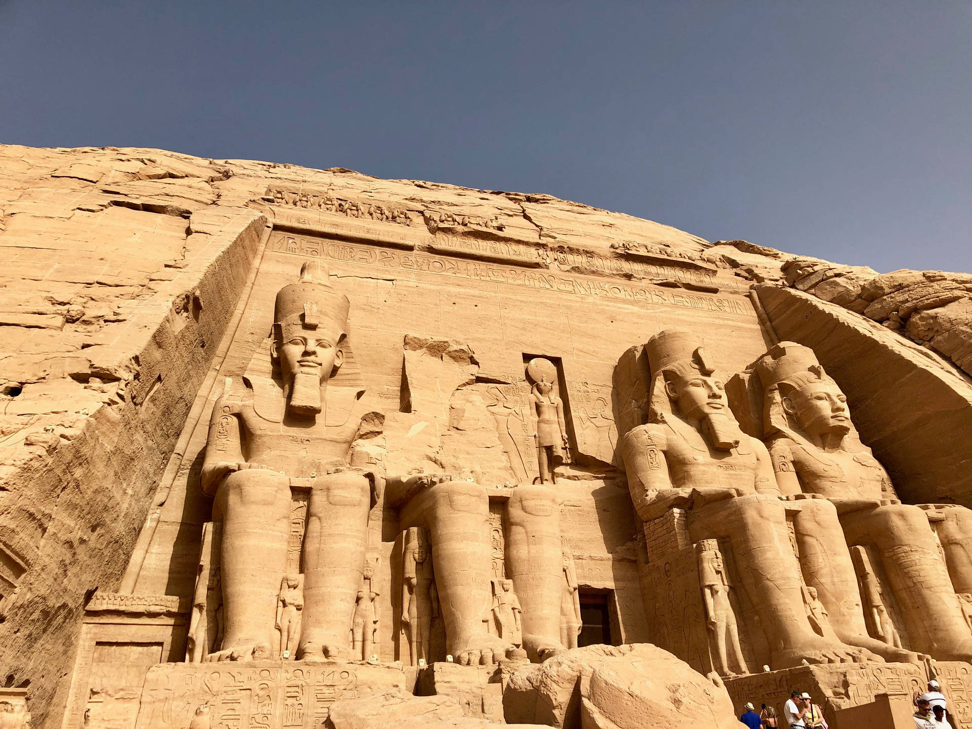 Worms'-eye View Of The Ramses The Great Temple, Abu Simbel Background