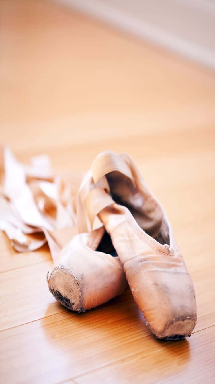 Worn-out Pointe Shoes Background