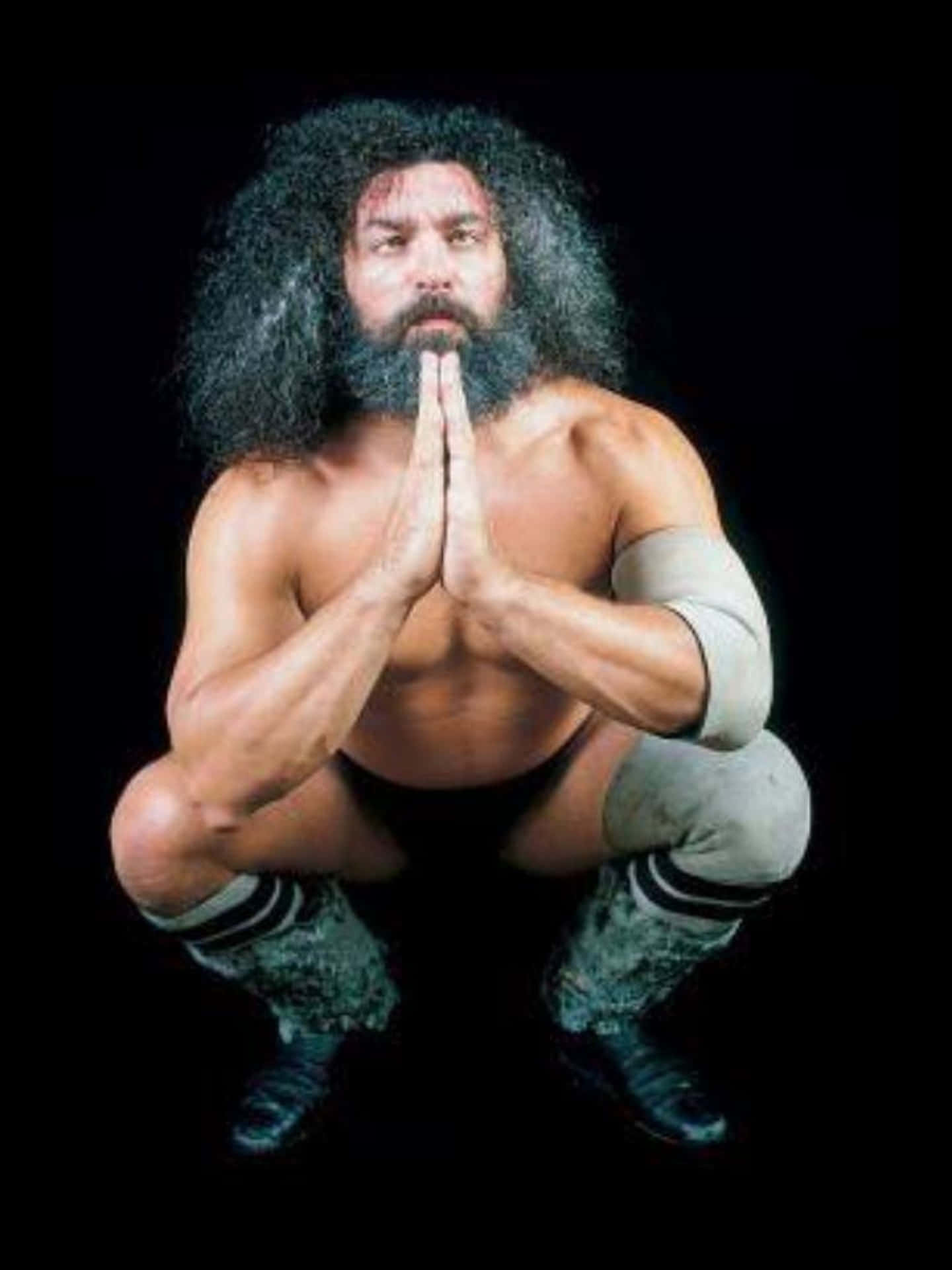 Wrestler Bruiser Brody Praying Background
