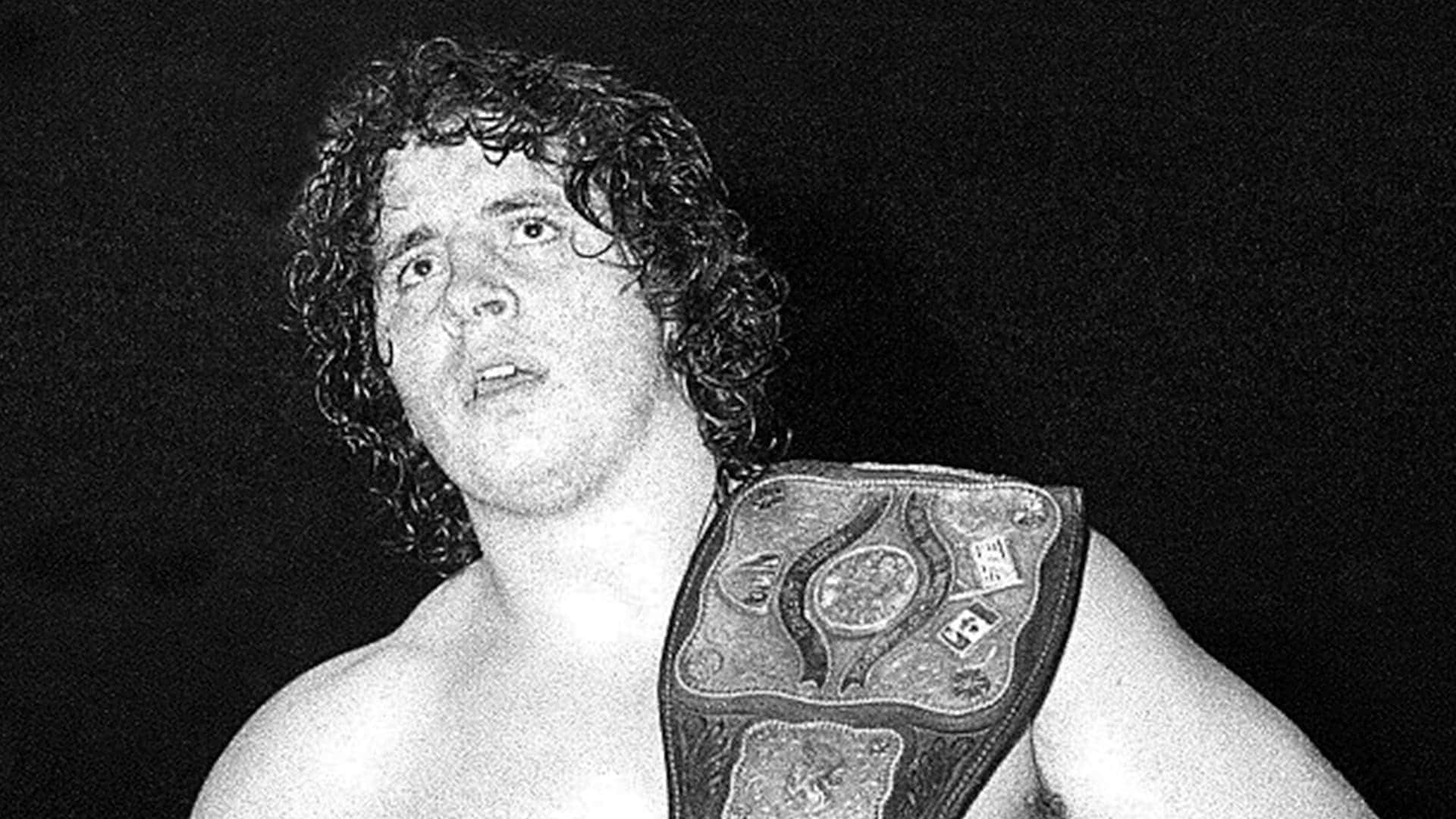 Wrestler Bruiser Brody With America Heavyweight Belt Background