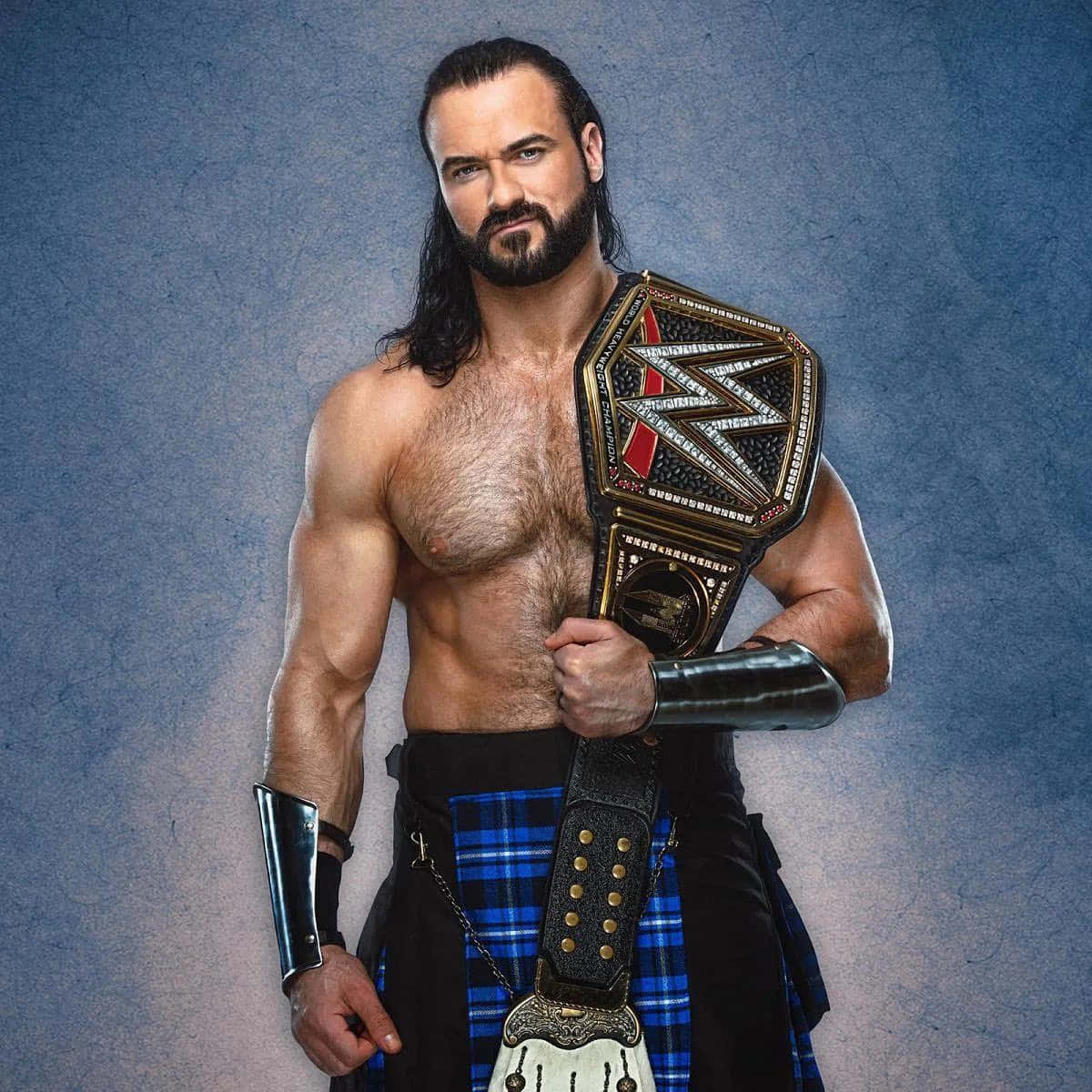 Wrestler Drew Mcintyre Celebrating Victory In Intercontinental Championship Background