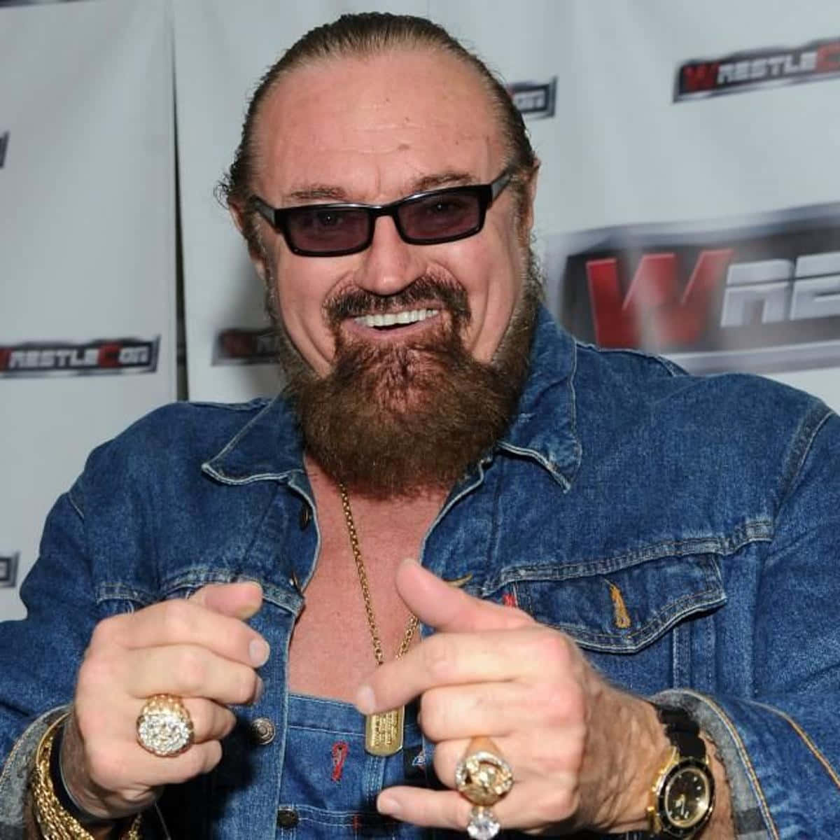 Wrestler Hillbilly Jim In Denim Jacket Background