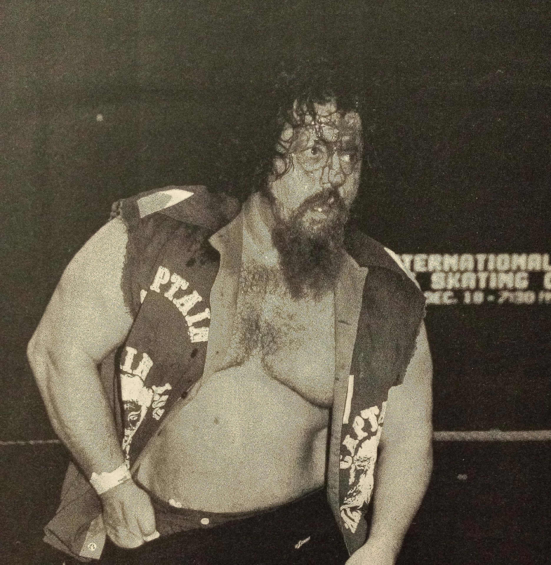 Wrestler_in_ Ring_ Attire_ Vintage_ Photo Background
