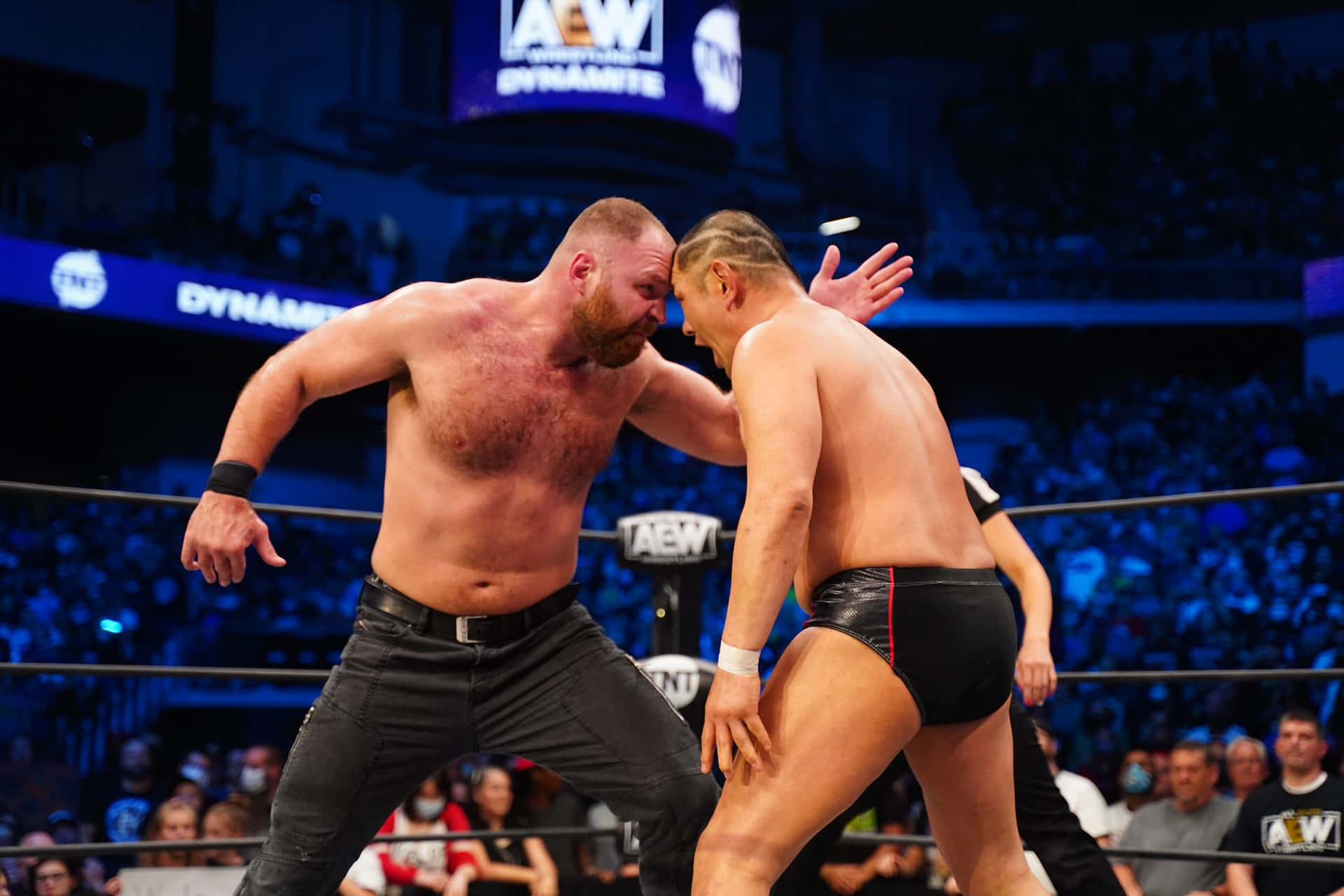 Wrestler Minoru Suzuki Fighting Jon Moxley Background