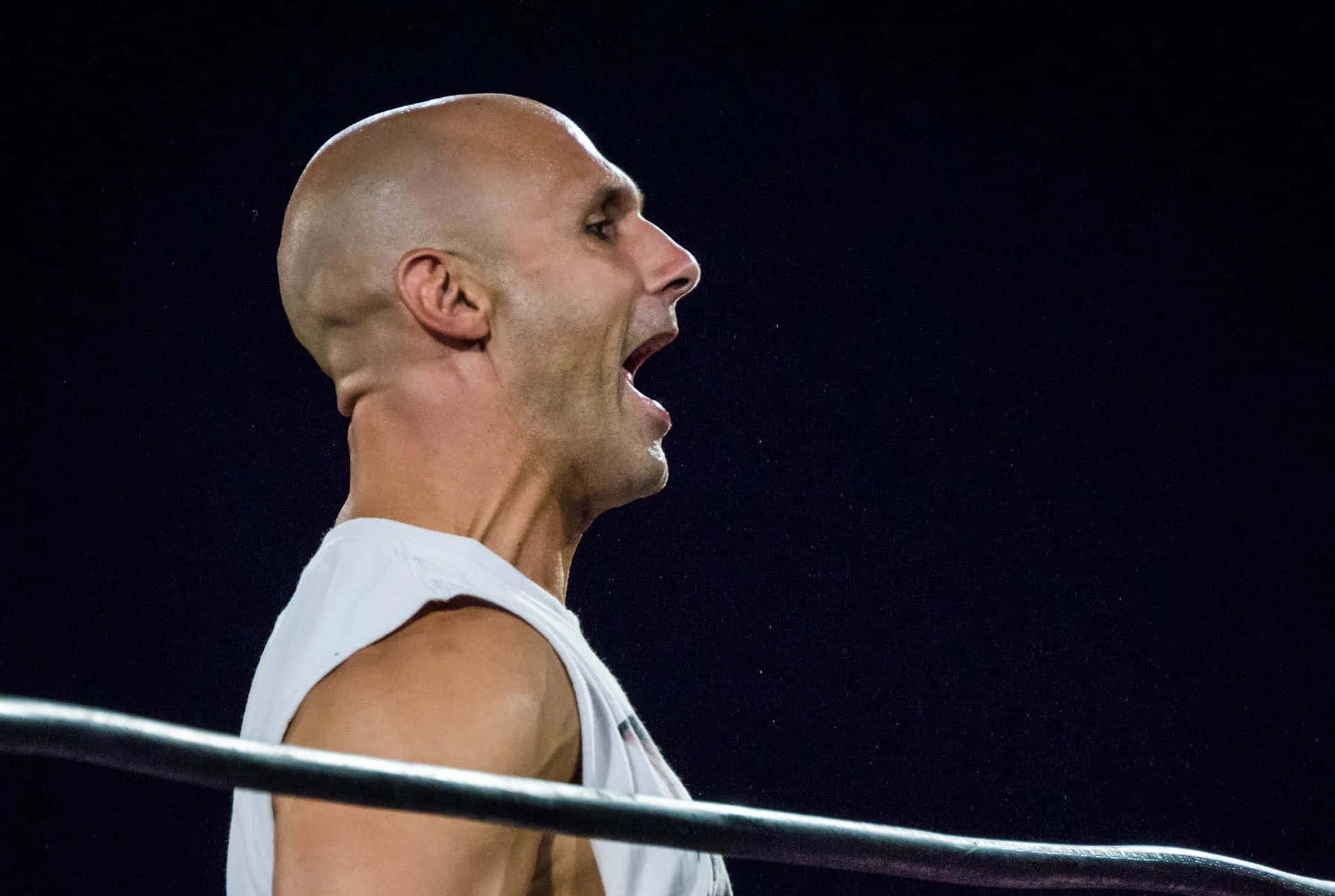 Wrestler Shoutinginthe Ring Background