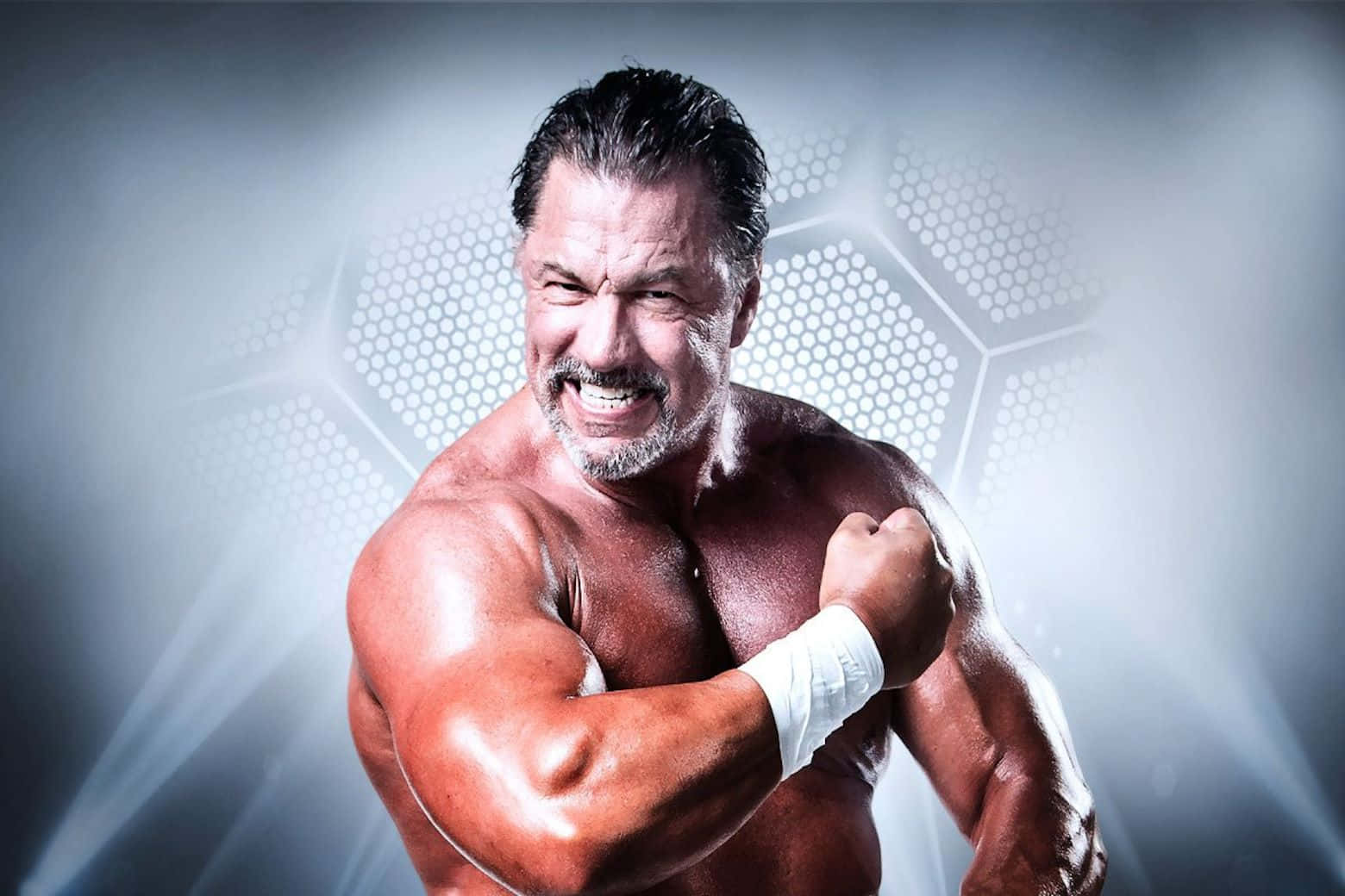 Wrestler Showing Off Muscles Background