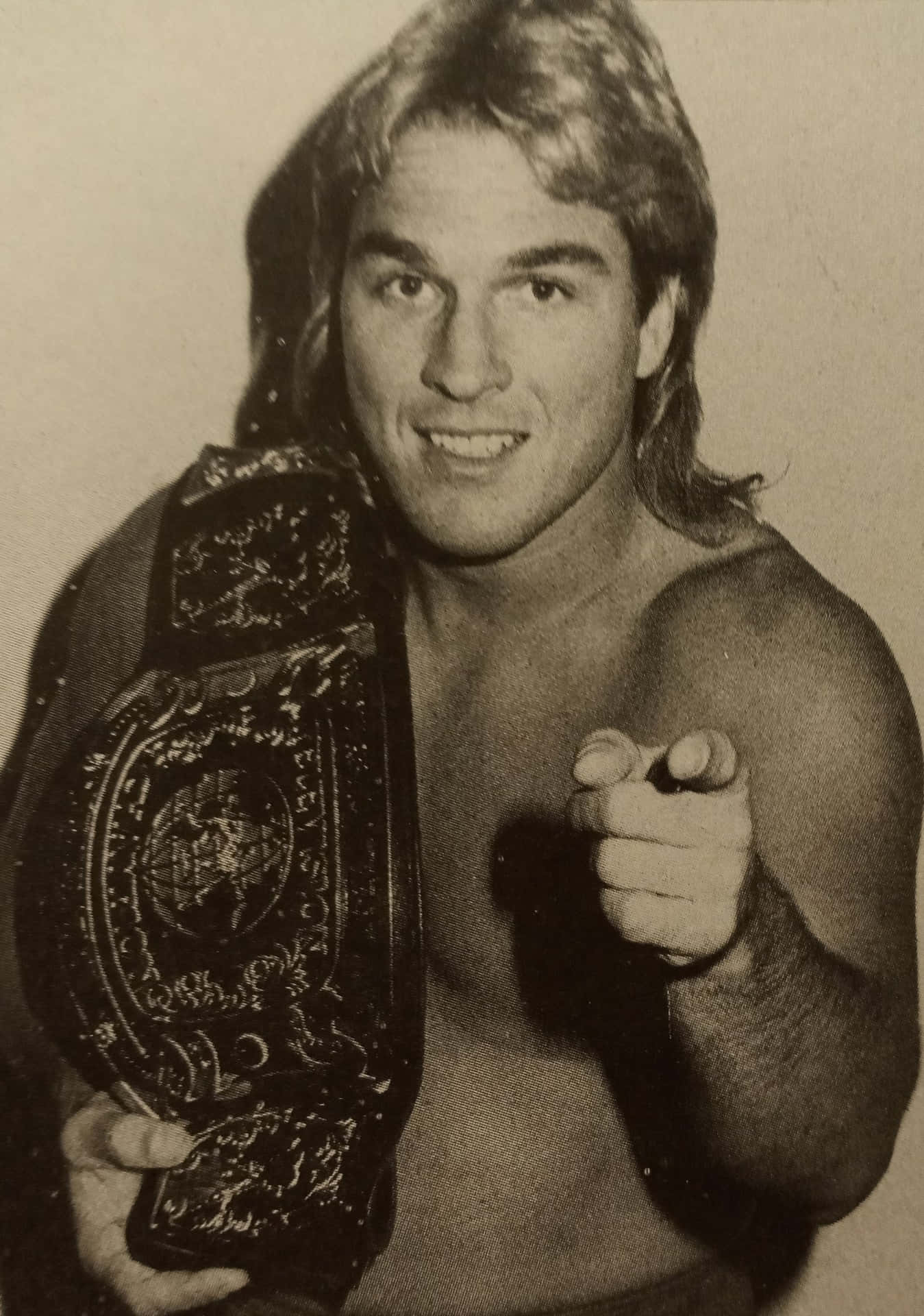 Wrestler With Championship Belt Background