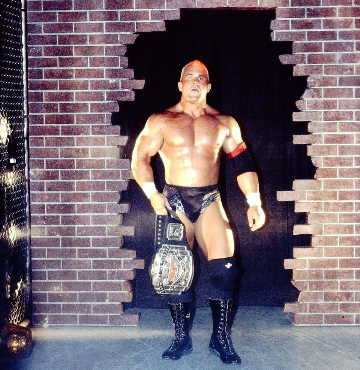 Wrestler_with_ Championship_ Belt_ Entryway Background