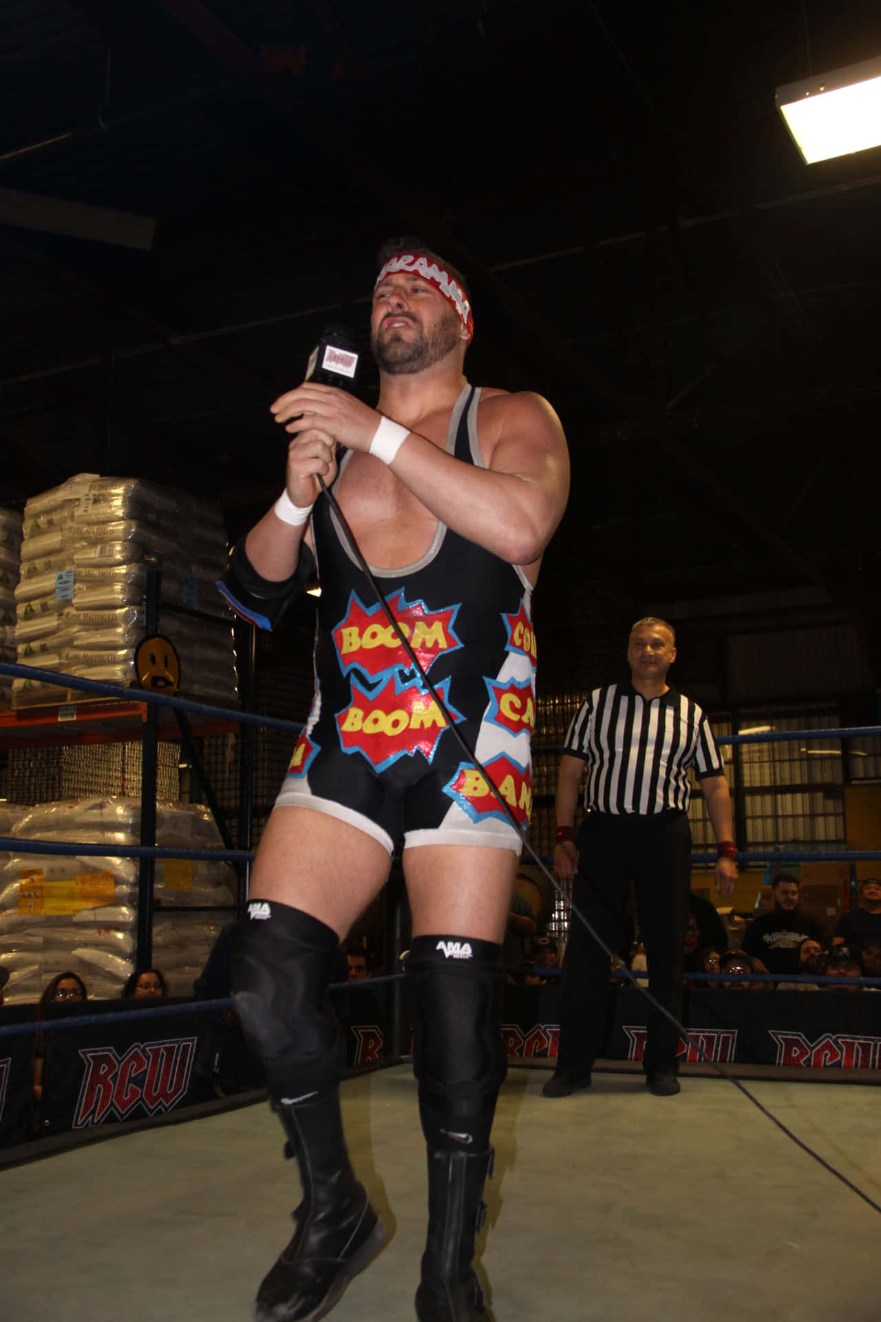 Wrestler_with_ Microphone_in_ Ring.jpg Background
