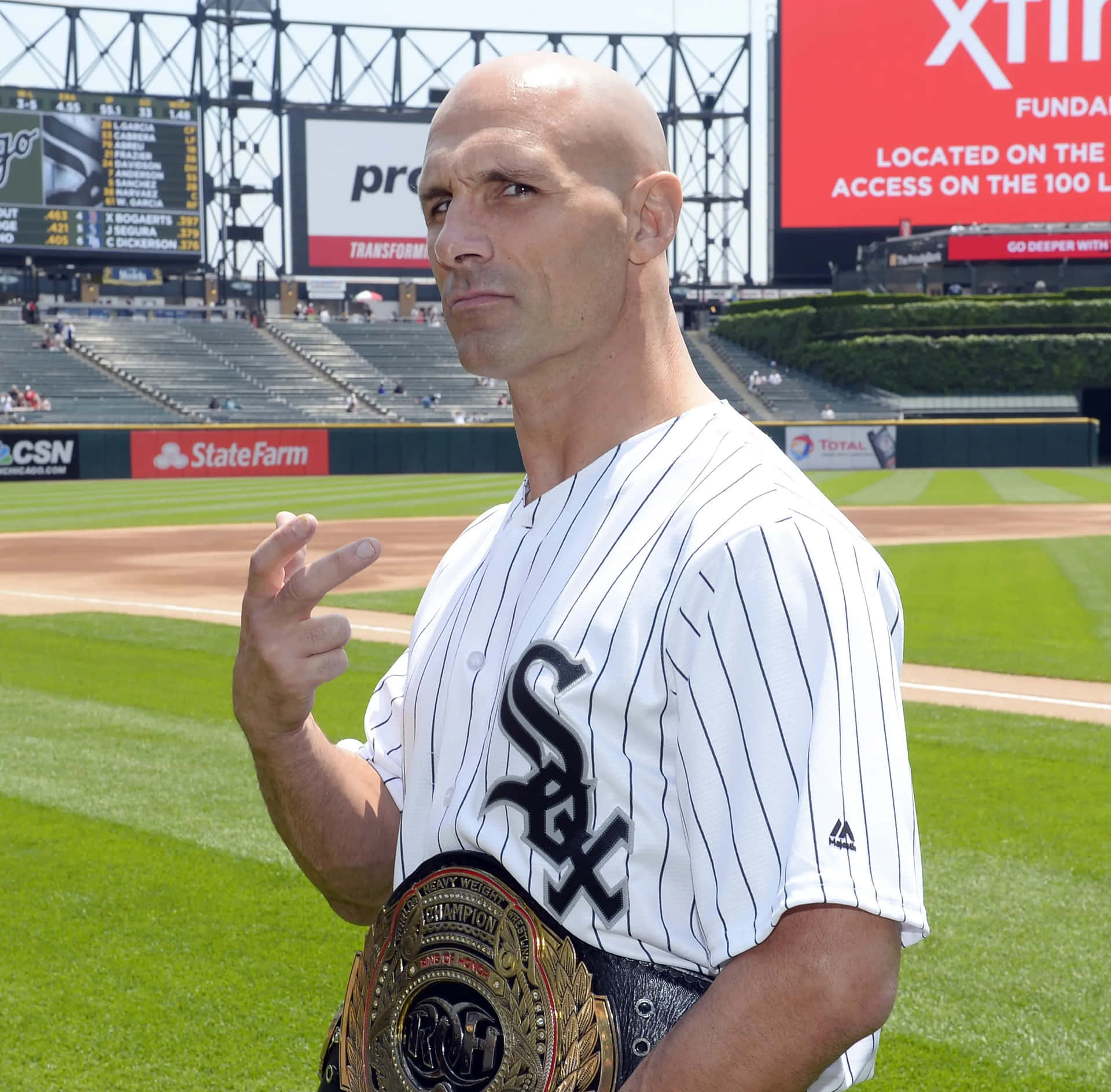 Wrestlerwith Championship Beltat Baseball Field